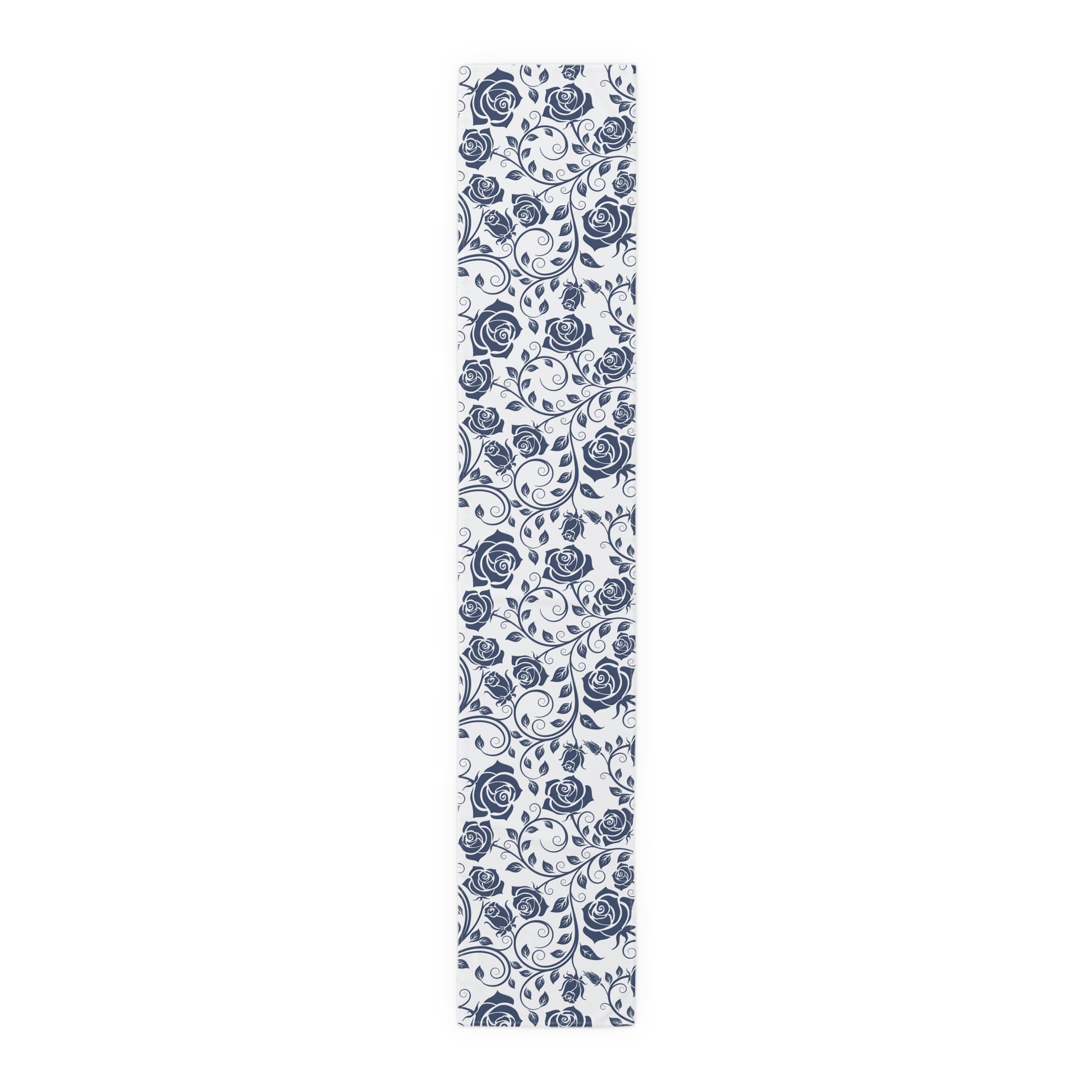 Table runner with blue floral pattern on a white background