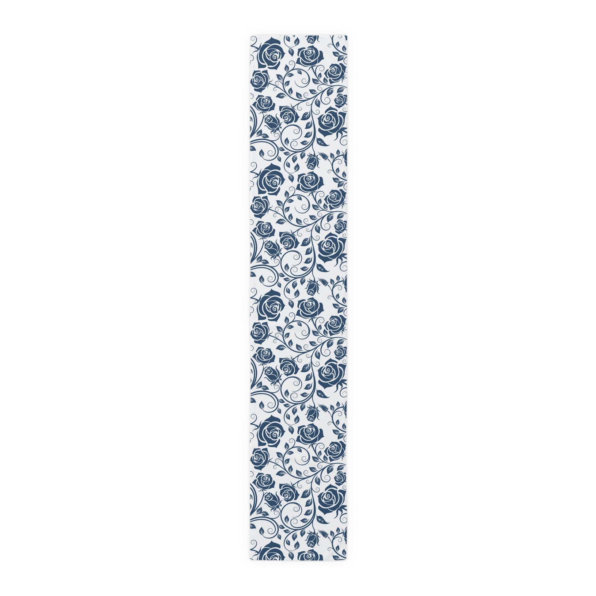 Table runner with blue floral pattern on a white background