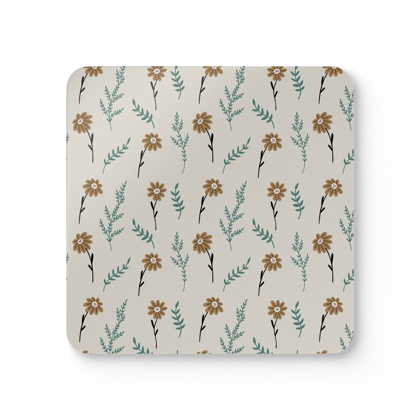 Square coaster with brown floral design on a gray background