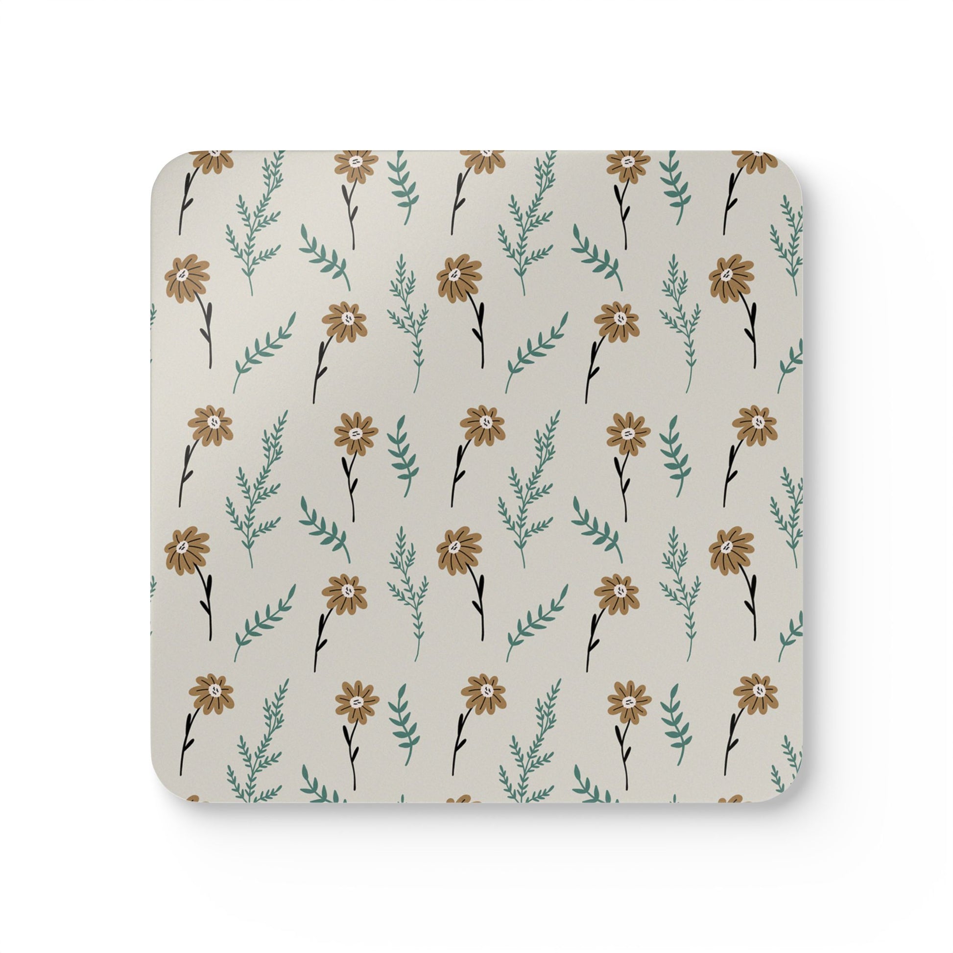 Square coaster with brown floral design on a gray background