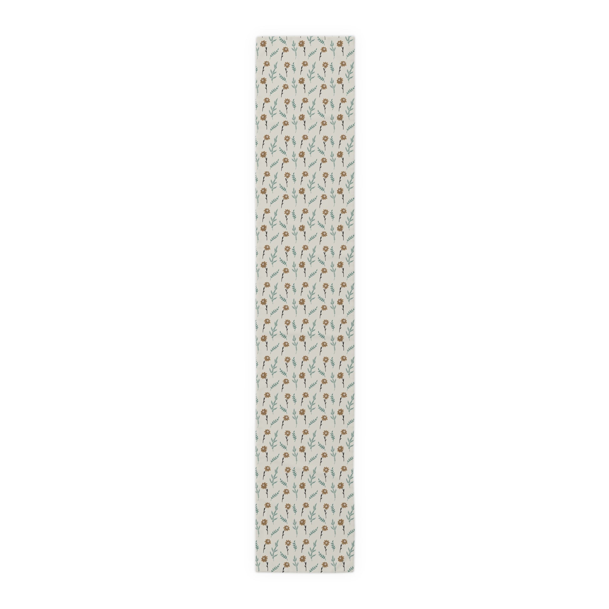 Our polyester 16" x 90" Brown Chamomile table runner that has a brown and gray floral-pattern on the table runner on a white background