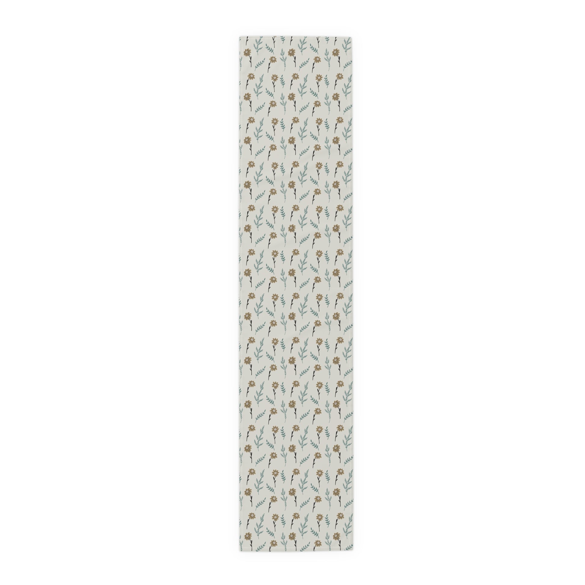 Our cotton 16" x 72 Brown Chamomile table runner that has a brown and gray floral-pattern on the table runner on a white background