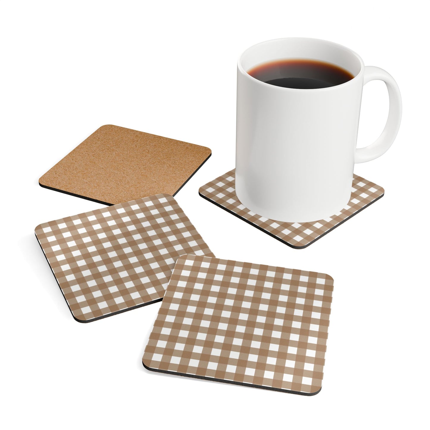 Set of 4 brown gingham checkered coasters with a white mug on a white background