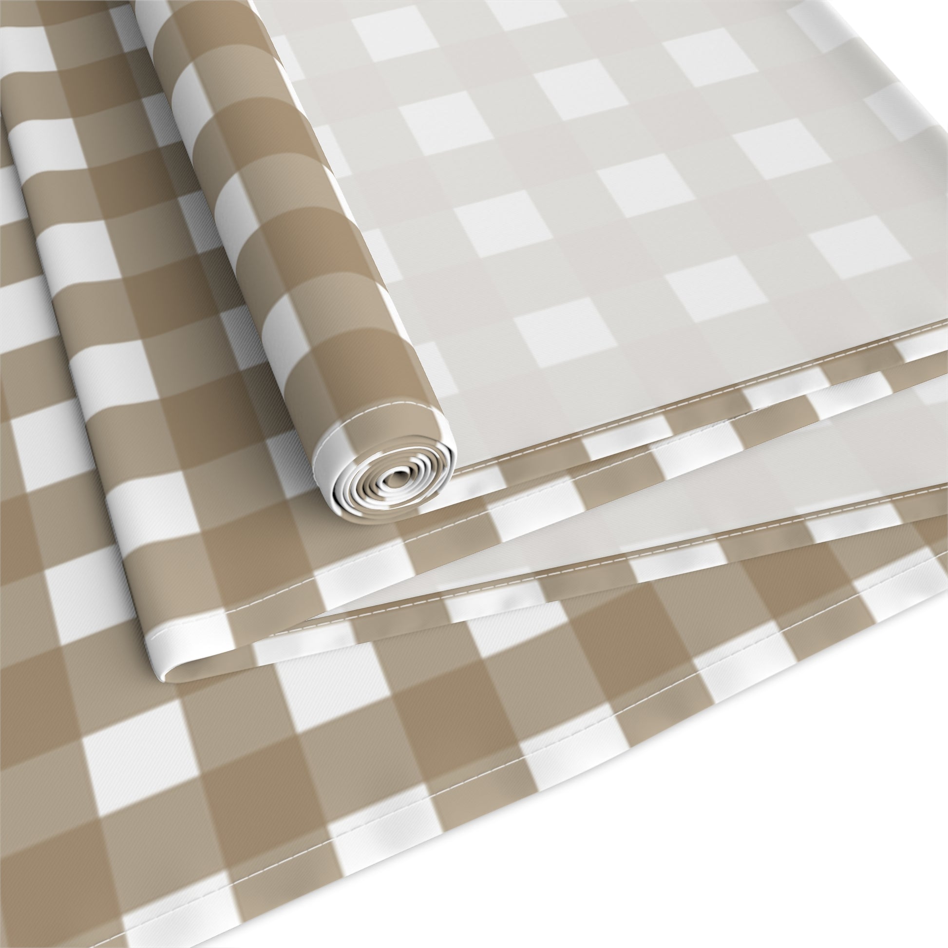 Our Brown Gingham checkered table runner rolled fabric on a white background