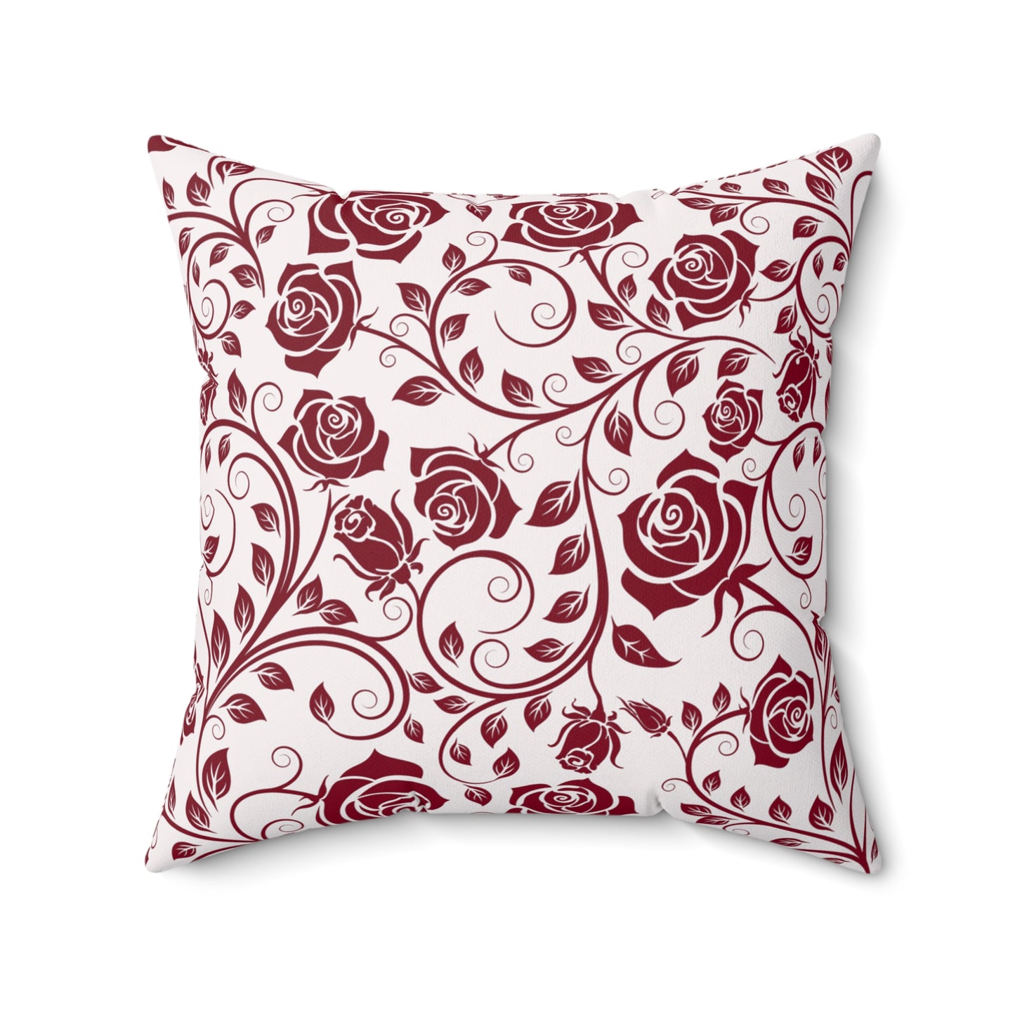 Decorative pillow with burgundy red rose pattern on a white background