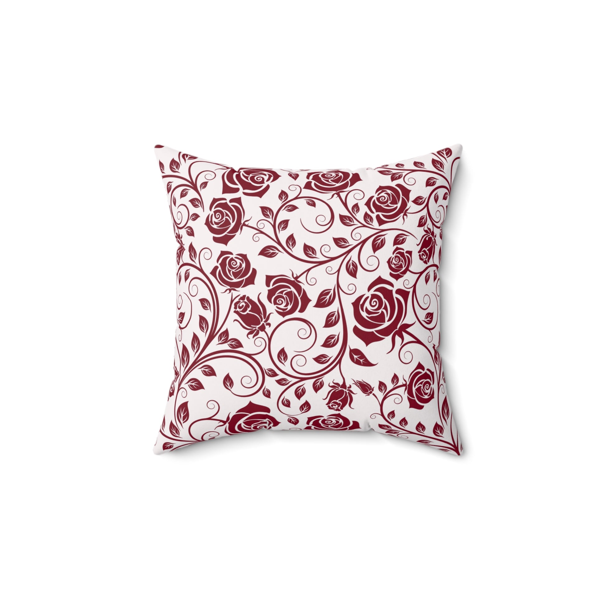 Decorative pillow with burgundy red rose pattern on a white background