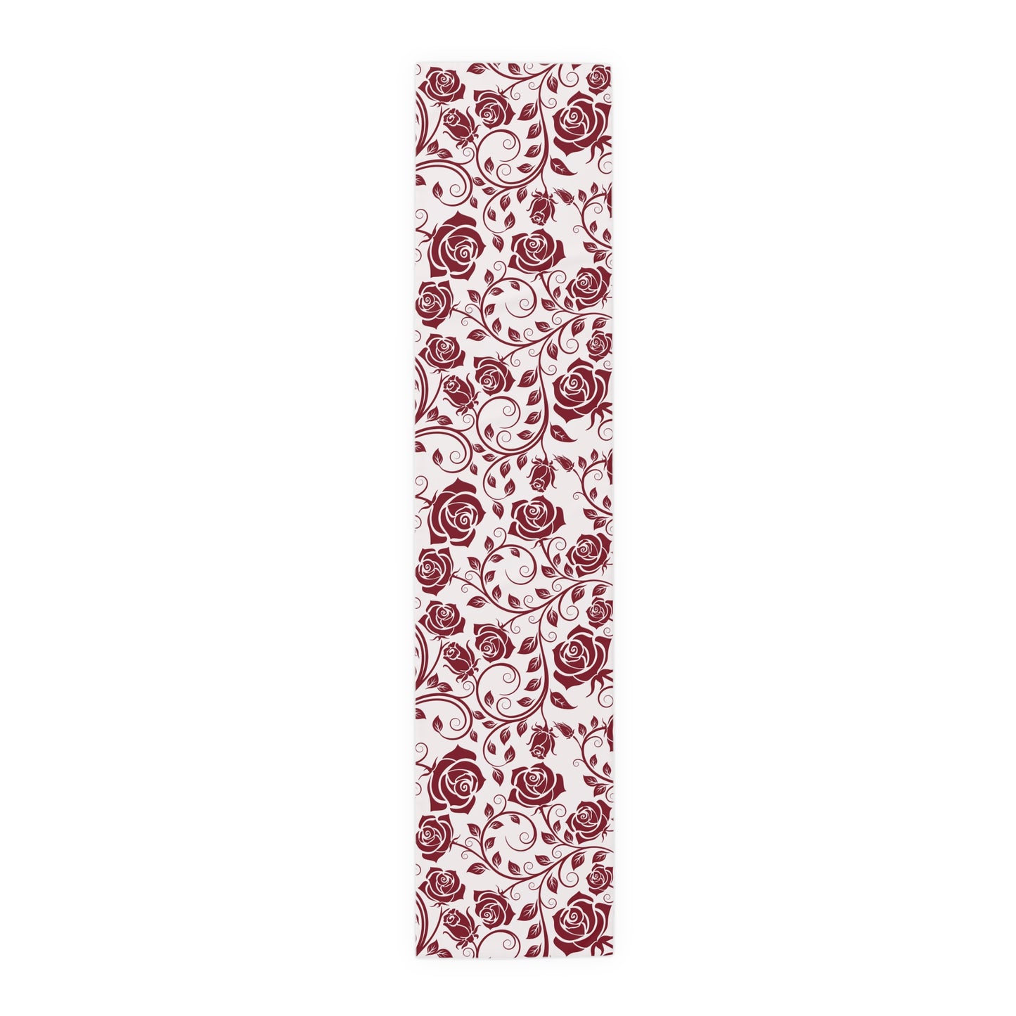 Table runner with red floral pattern on a white background