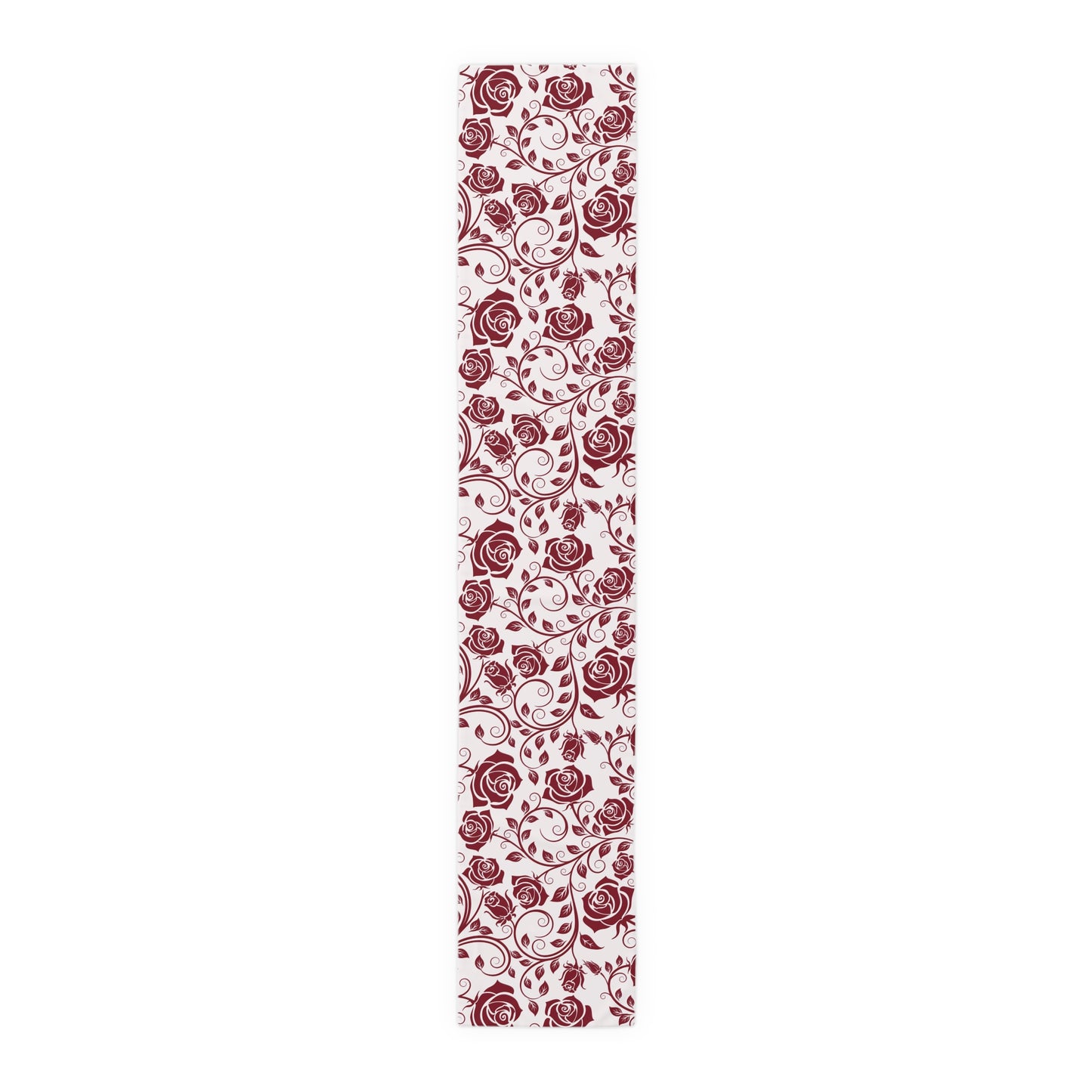 Table runner with red floral pattern on a white background