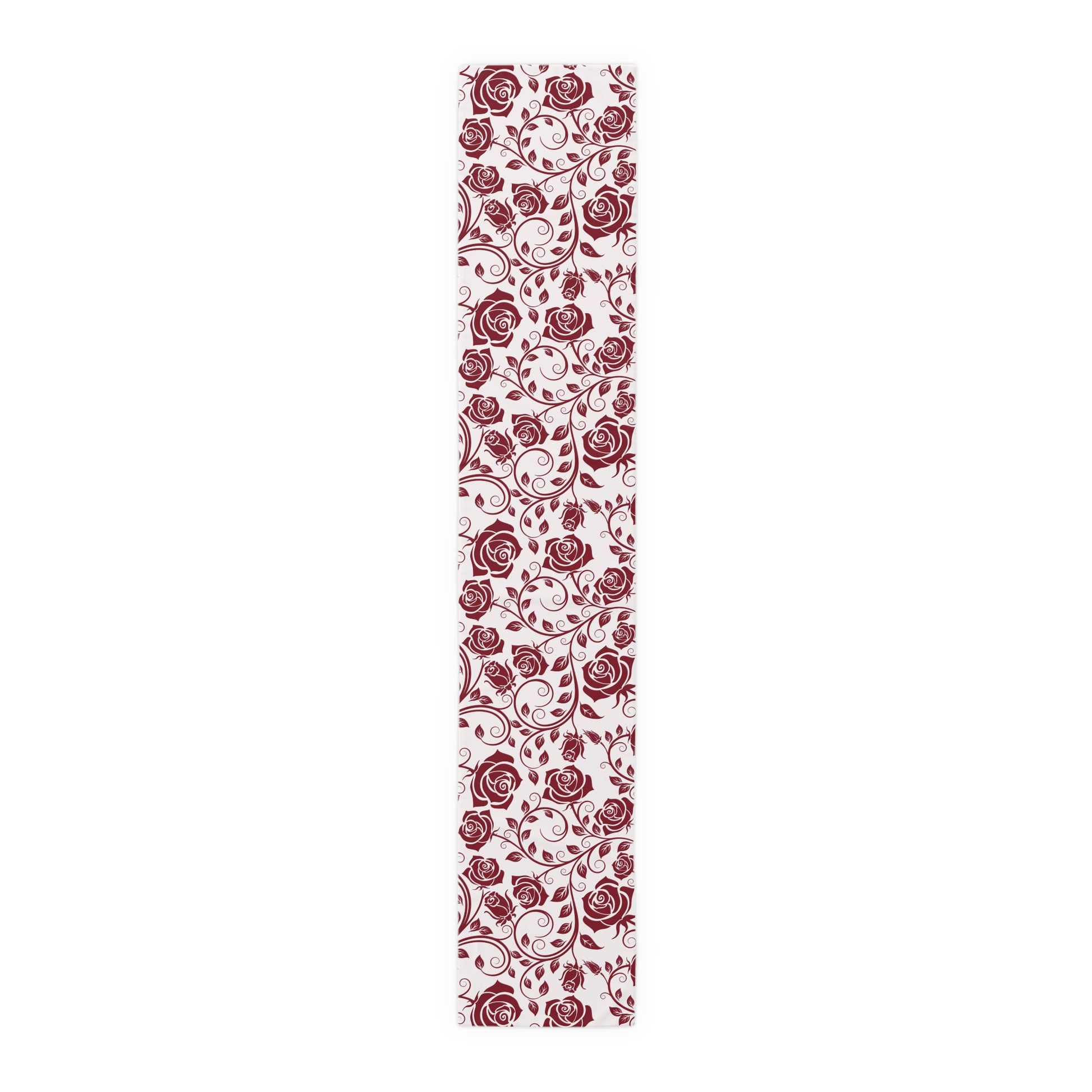 Table runner with red floral pattern on a white background