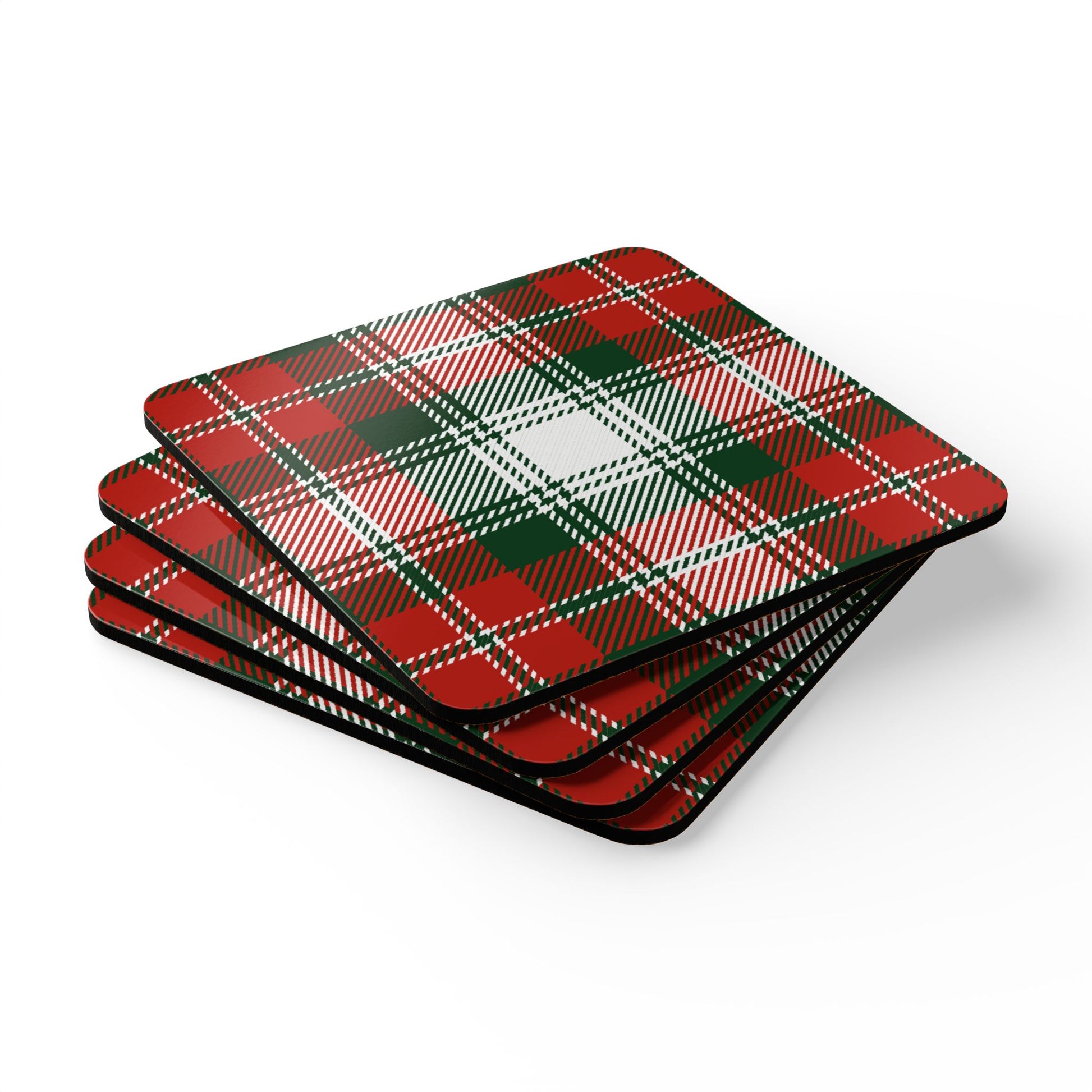 Set of four red and green plaid coasters on a white background