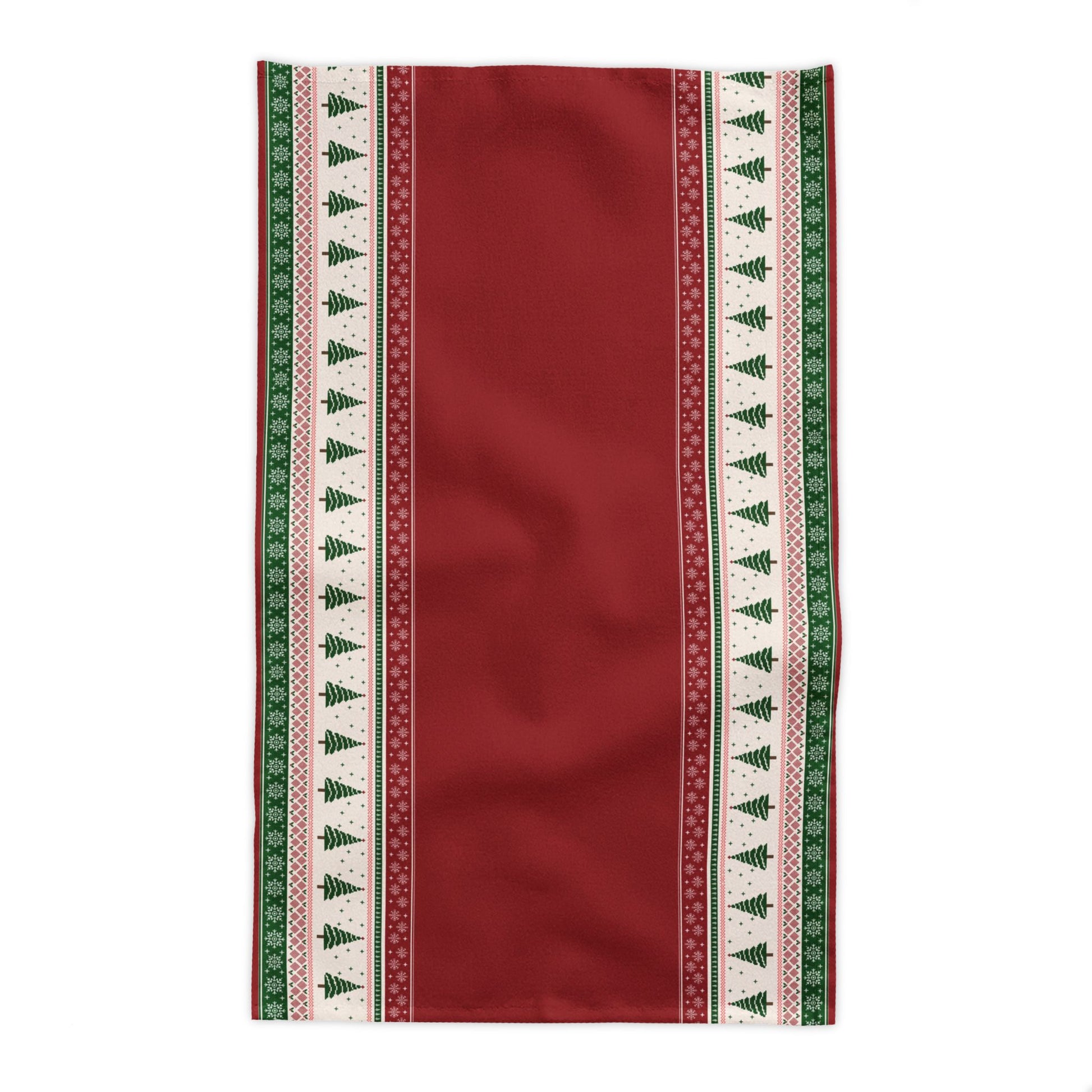 Rectangle red tablecloth with Christmas trees and snowflakes red and green pattern on a white background