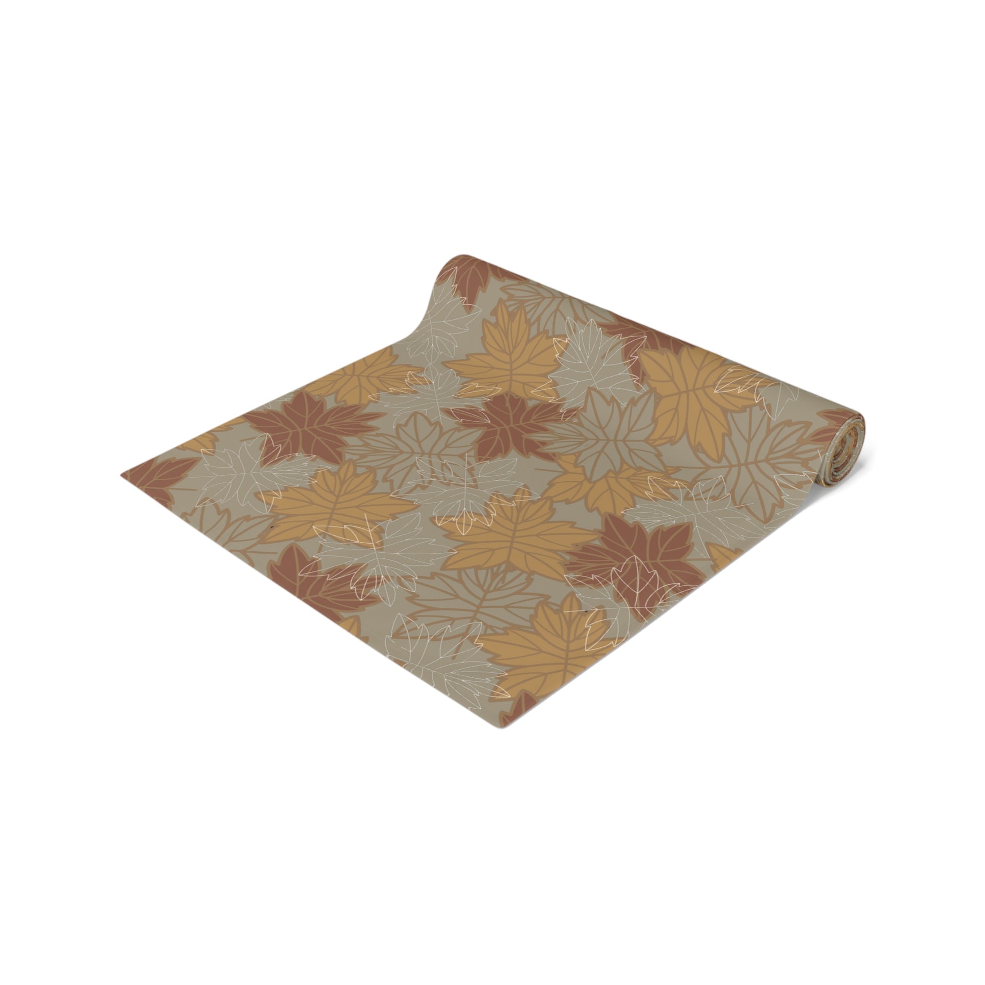 Roll of table runner with autumn leaf pattern on a white background