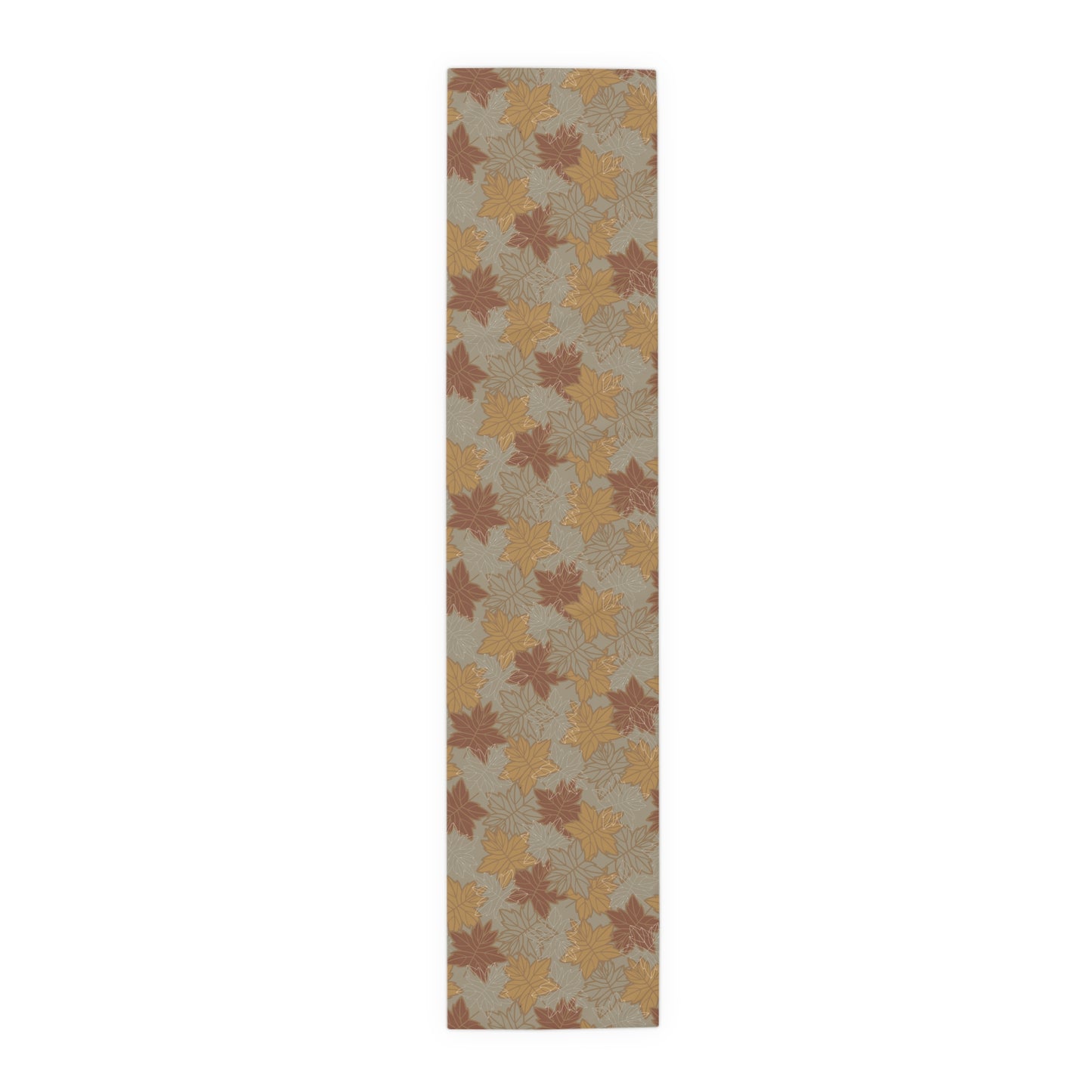 Table runner with autumn leaf pattern on a white background