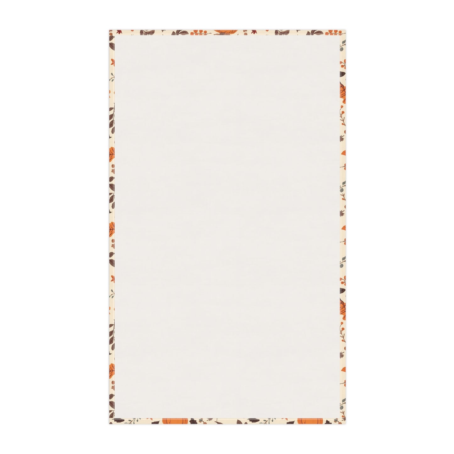 Back view of tea towel with a colorful border of fall leaves and pumpkins on a white background