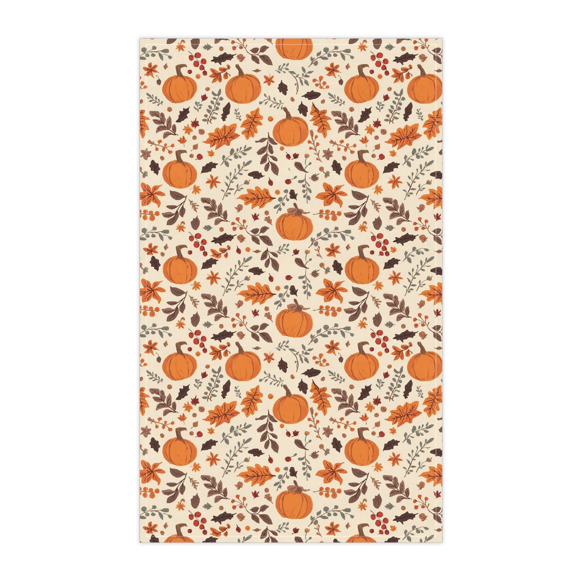 Decorative kitchen tea towel with pumpkins and leaves pattern on a beige background
