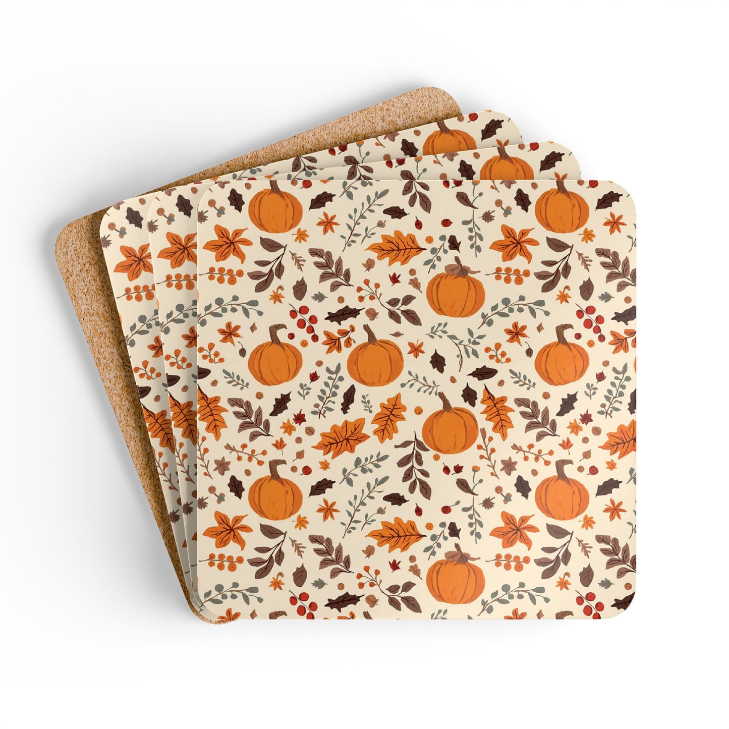 Set of four coasters with pumpkin and leaf pattern on a beige background