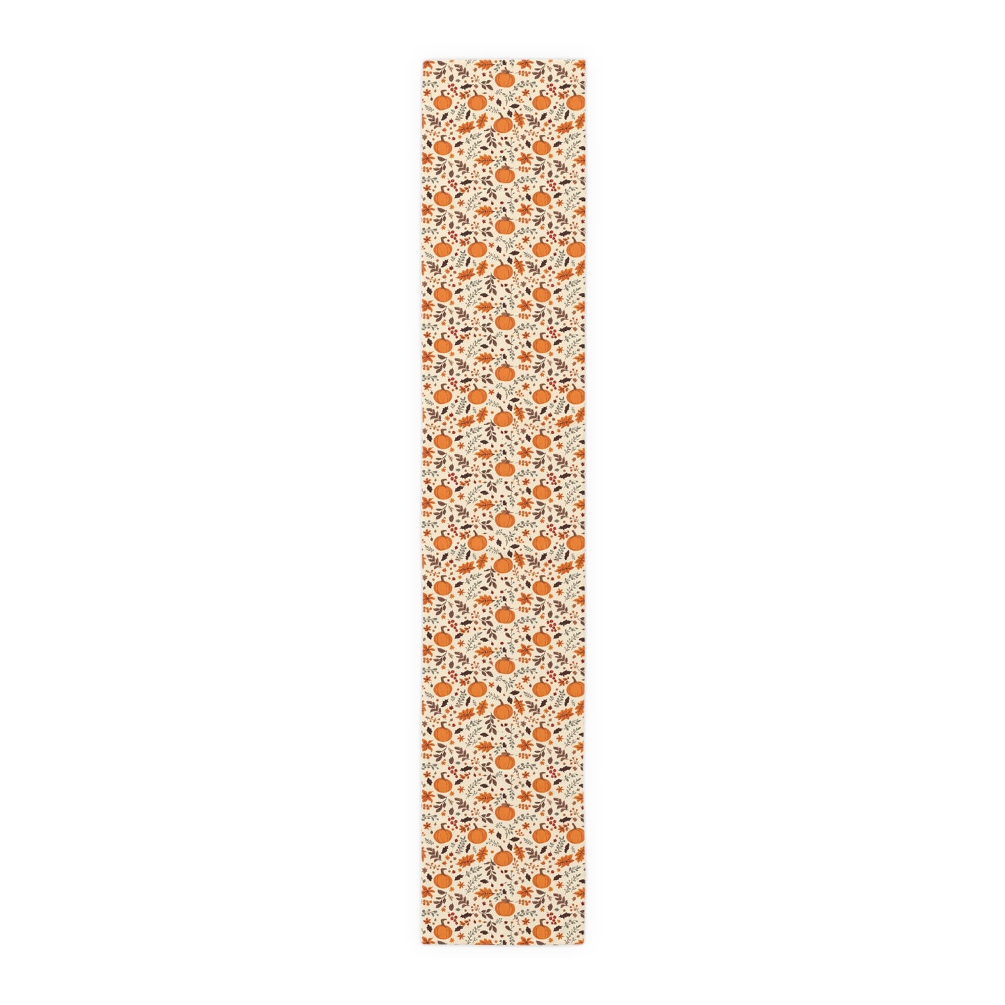 Fall Leaves and Pumpkins 16" x 90" polyester table runner has brown and orange fall leaves with orange pumpkins with beige background printed on the table runner shown on a white background.