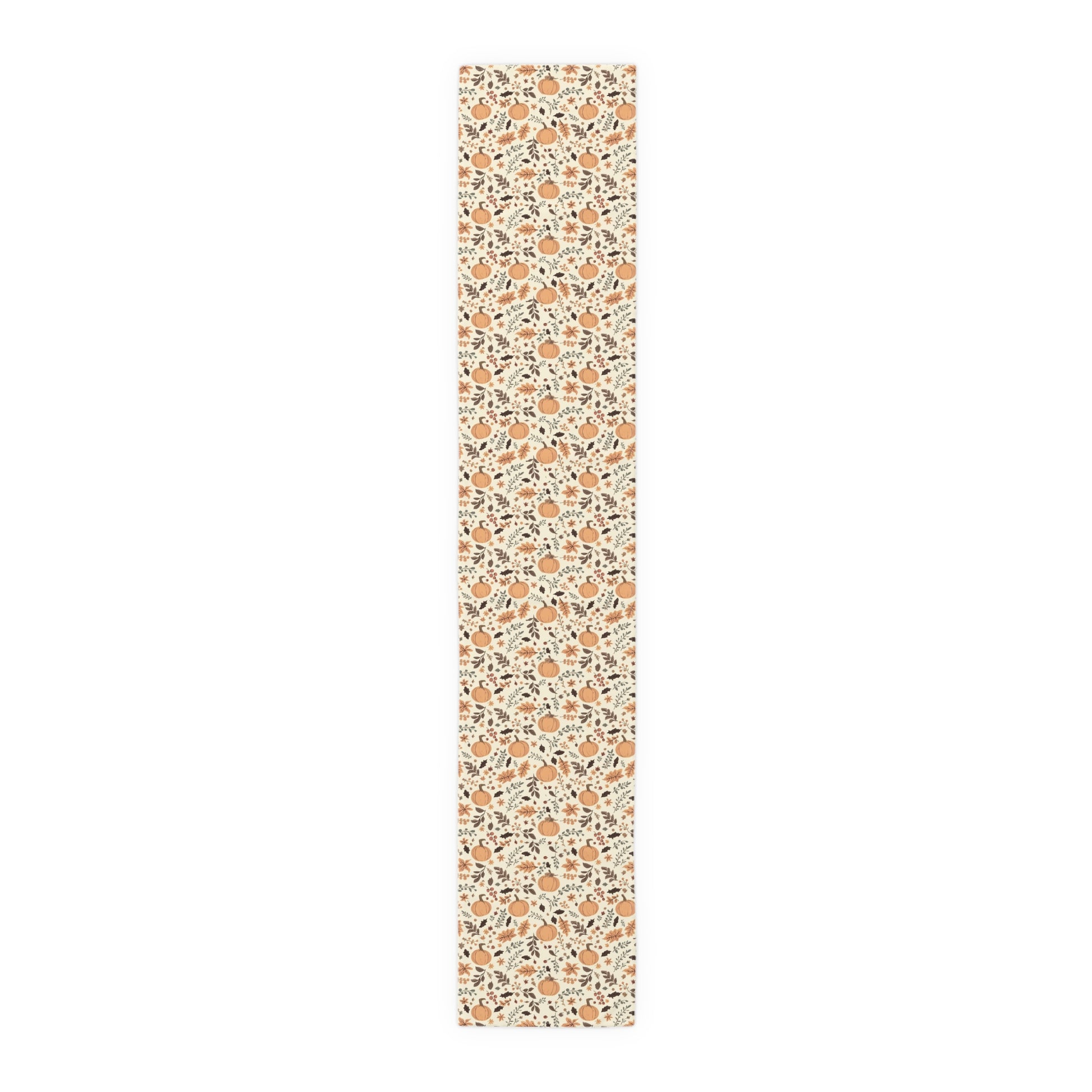 Fall Leaves and Pumpkins 16" x 90" cotton twill table runner has brown and orange fall leaves with orange pumpkins with beige background printed on the table runner shown on a white background. 