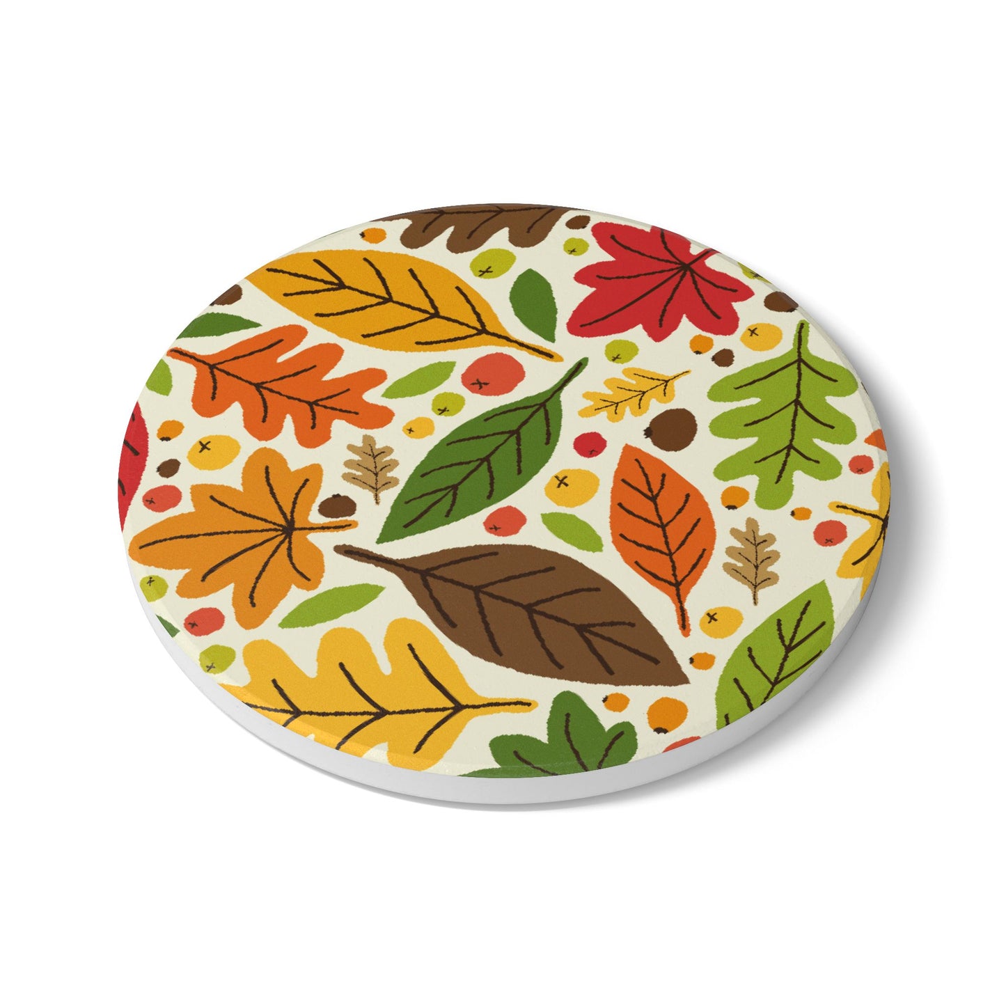 Fall Leaves round ceramic tile coaster with autumn leaf design on a white background