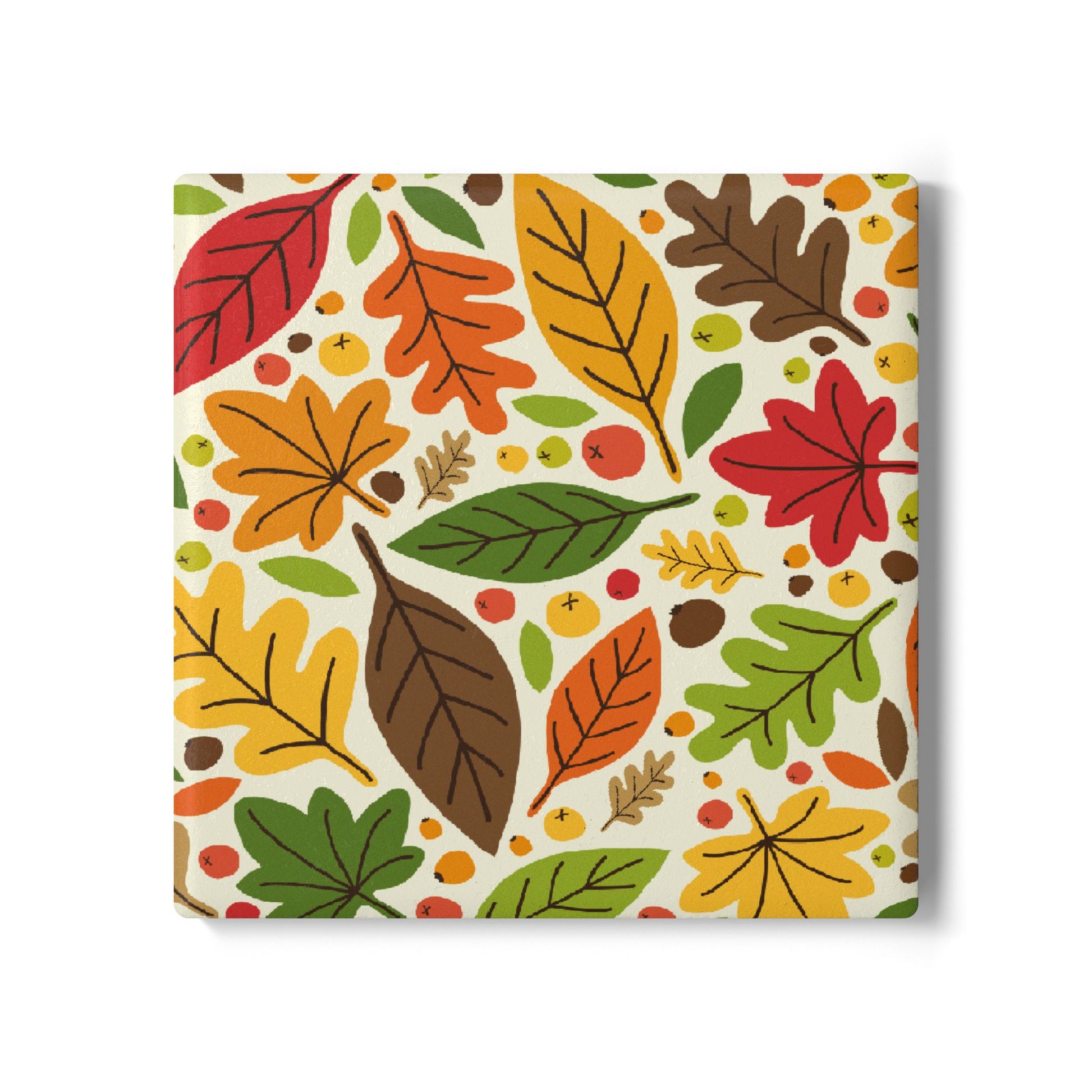 Fall Leaves ceramic tile square coaster with colorful autumn leaves on top of tile coaster on a white background