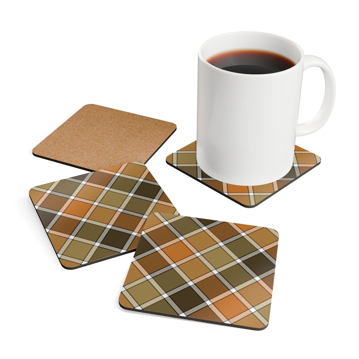 Set of 4 fall colored plaid coasters with a white mug on a white background
