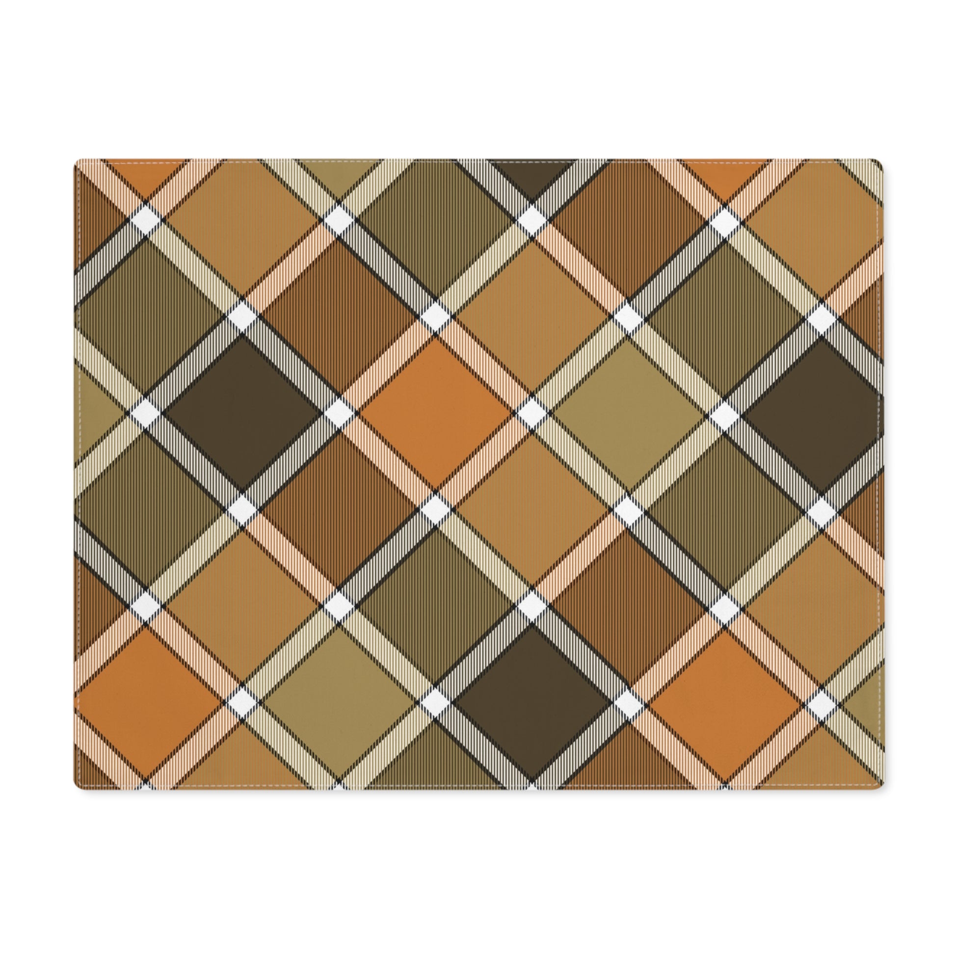 Fall Plaid placemat has plaid patterned colors with brown, orange, and green colors. The placemat sits on a white background.