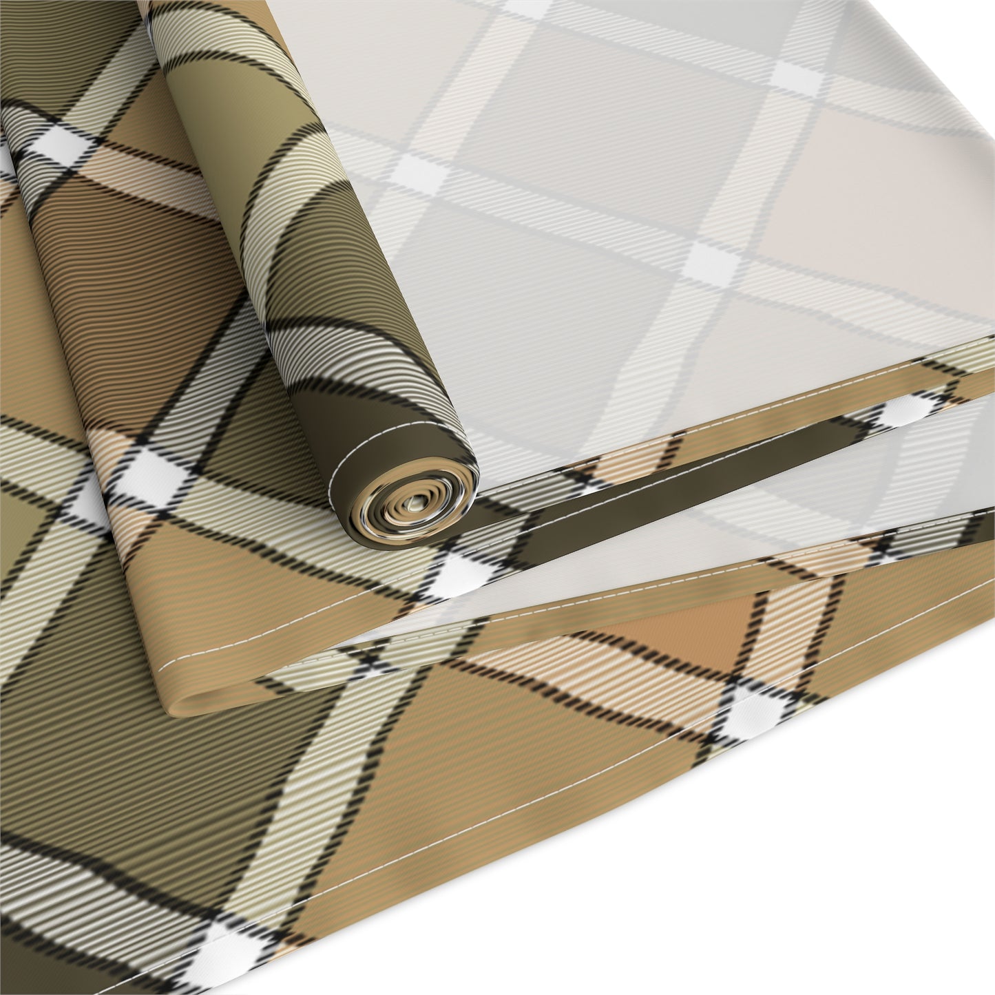 Our cotton twill Fall Plaid table runner has brown, green, orange patterned colors. The table runner is rolled up on a white background