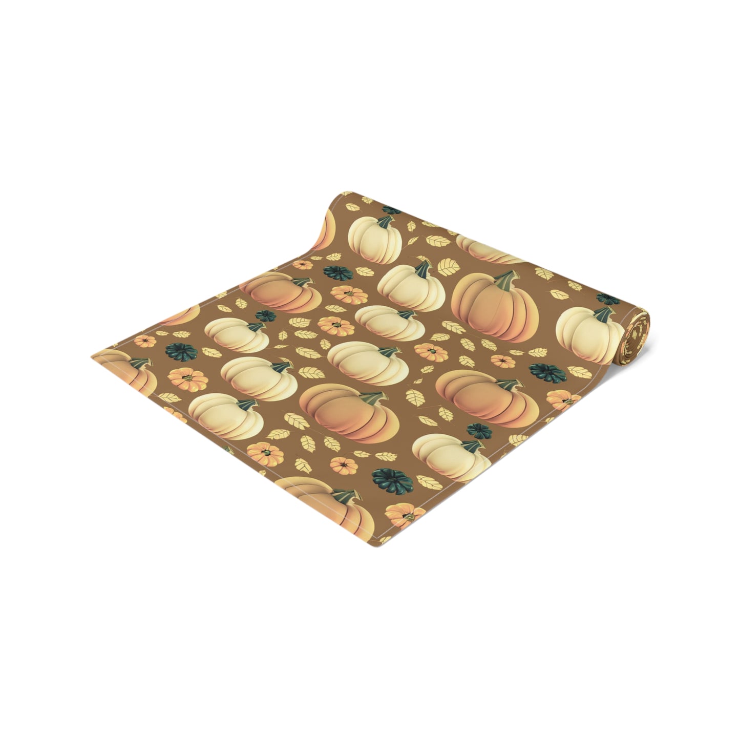 Fall Pumpkins table runner with a pumpkin-themed pattern printed on front of table runner rolled up on a white background.