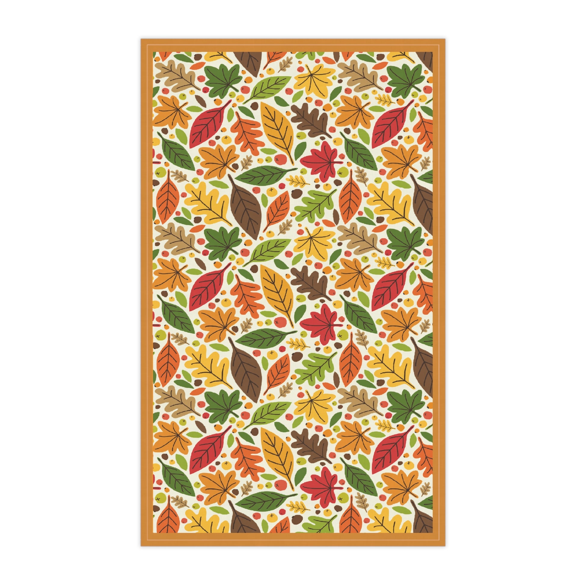 Decorative kitchen tea towel with autumn leaf pattern on a white background