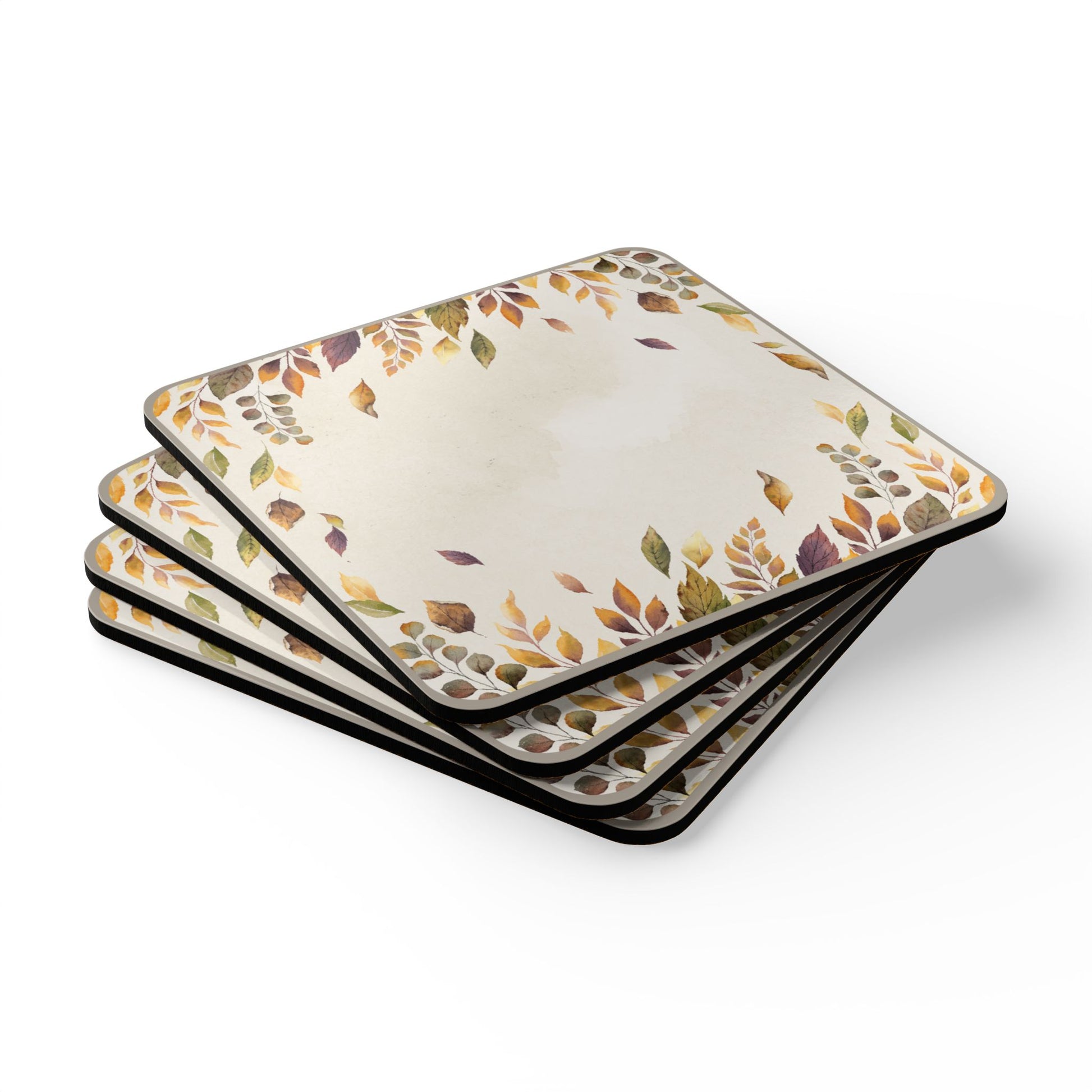 Set of four fallen leaves coasters with autumn leaf pattern on a white background