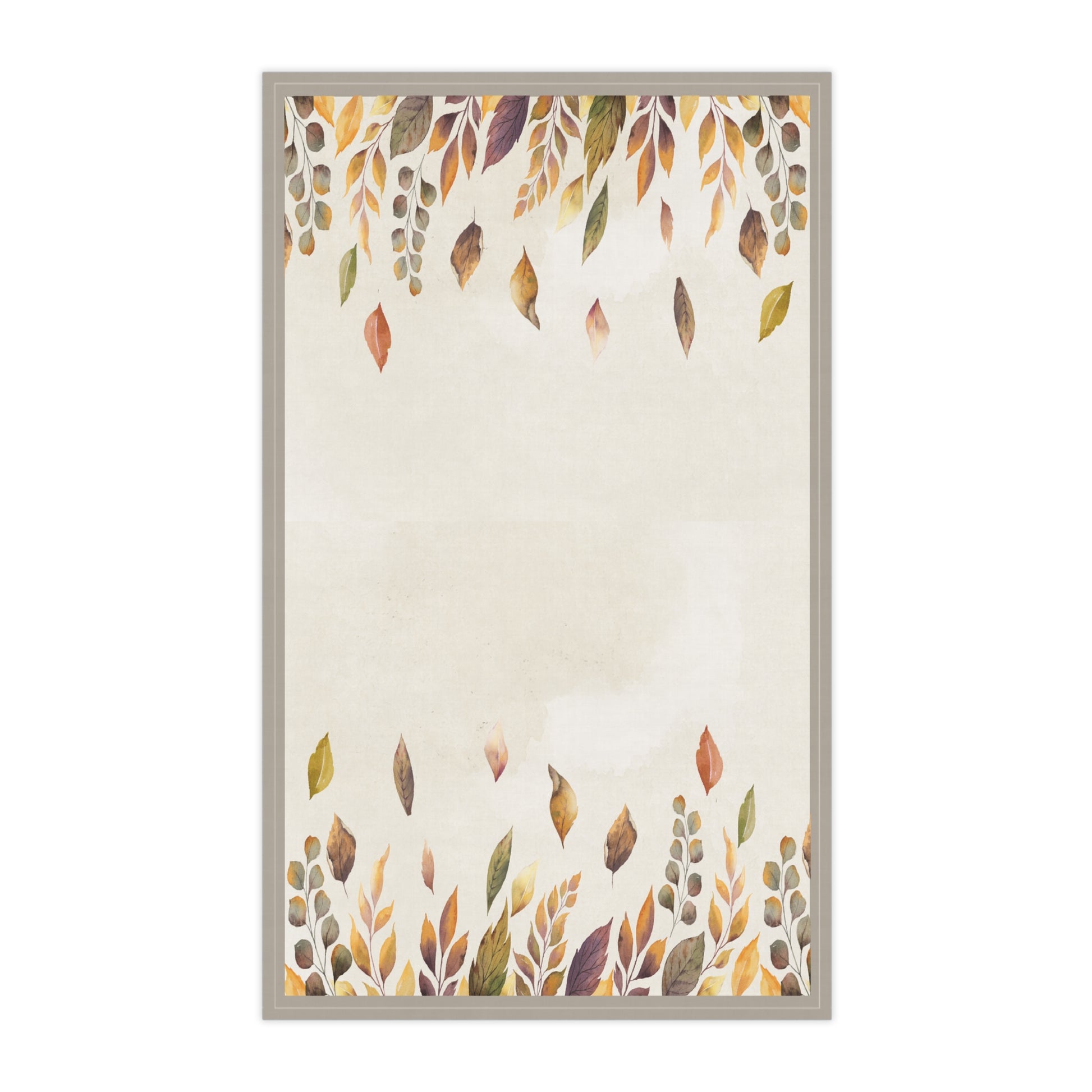 Decorative tea towel with autumn leaf design on a white background