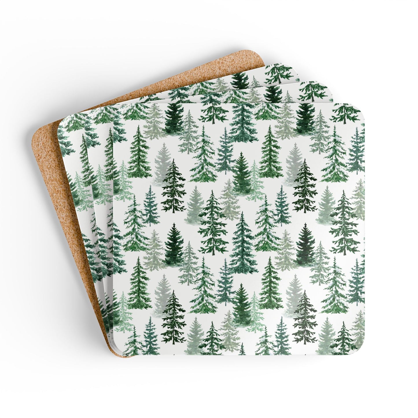 Fraser Fir coasters set of 4 with green and white forest pattern on front of coaster, one coaster show backside of cork backing, on a white background