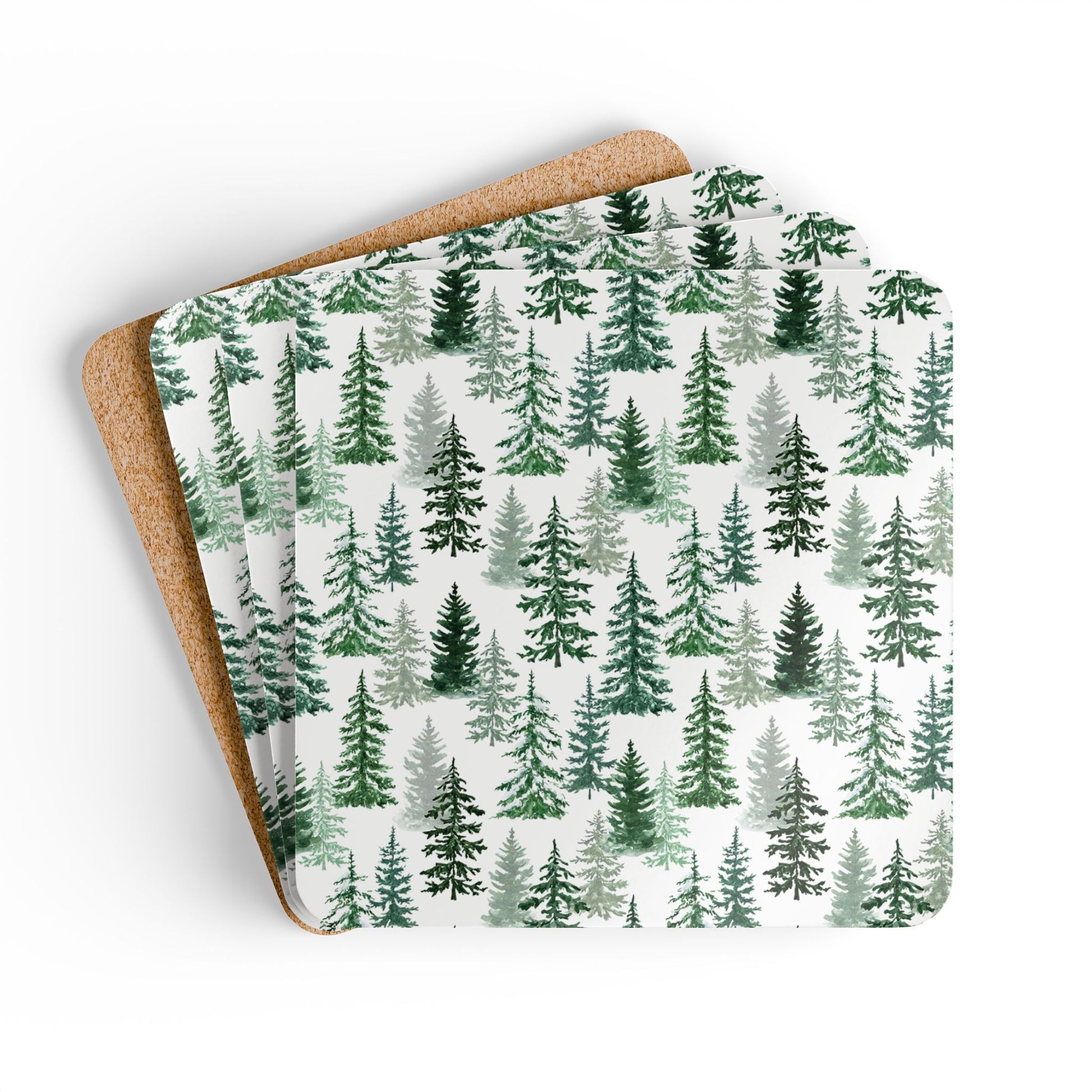 Fraser Fir coasters set of 4 with green and white forest pattern on front of coaster, one coaster show backside of cork backing, on a white background