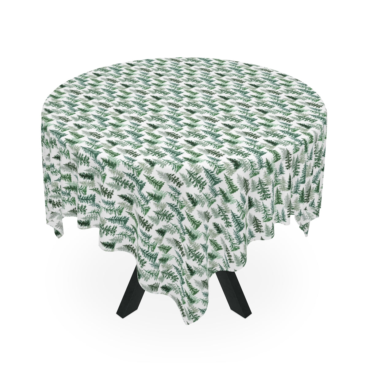 Round table with Fraser Fir tablecloth has a green and white tree pattern on tablecloth on a white background