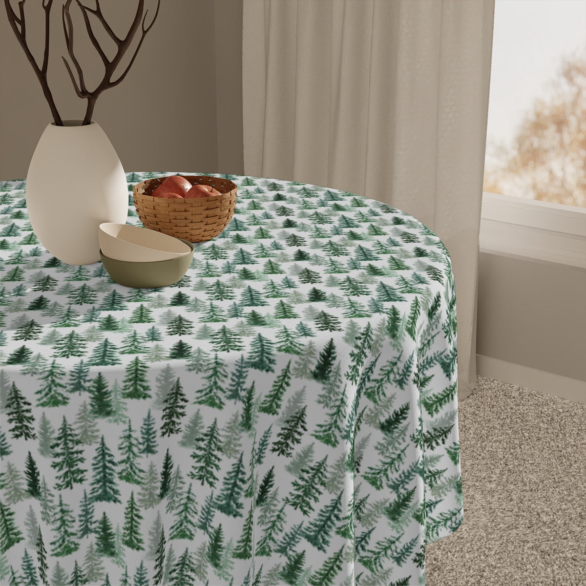 Round table with fraser fir tablecloth has green and white forest pattern ob tablecloth, in a room setting
