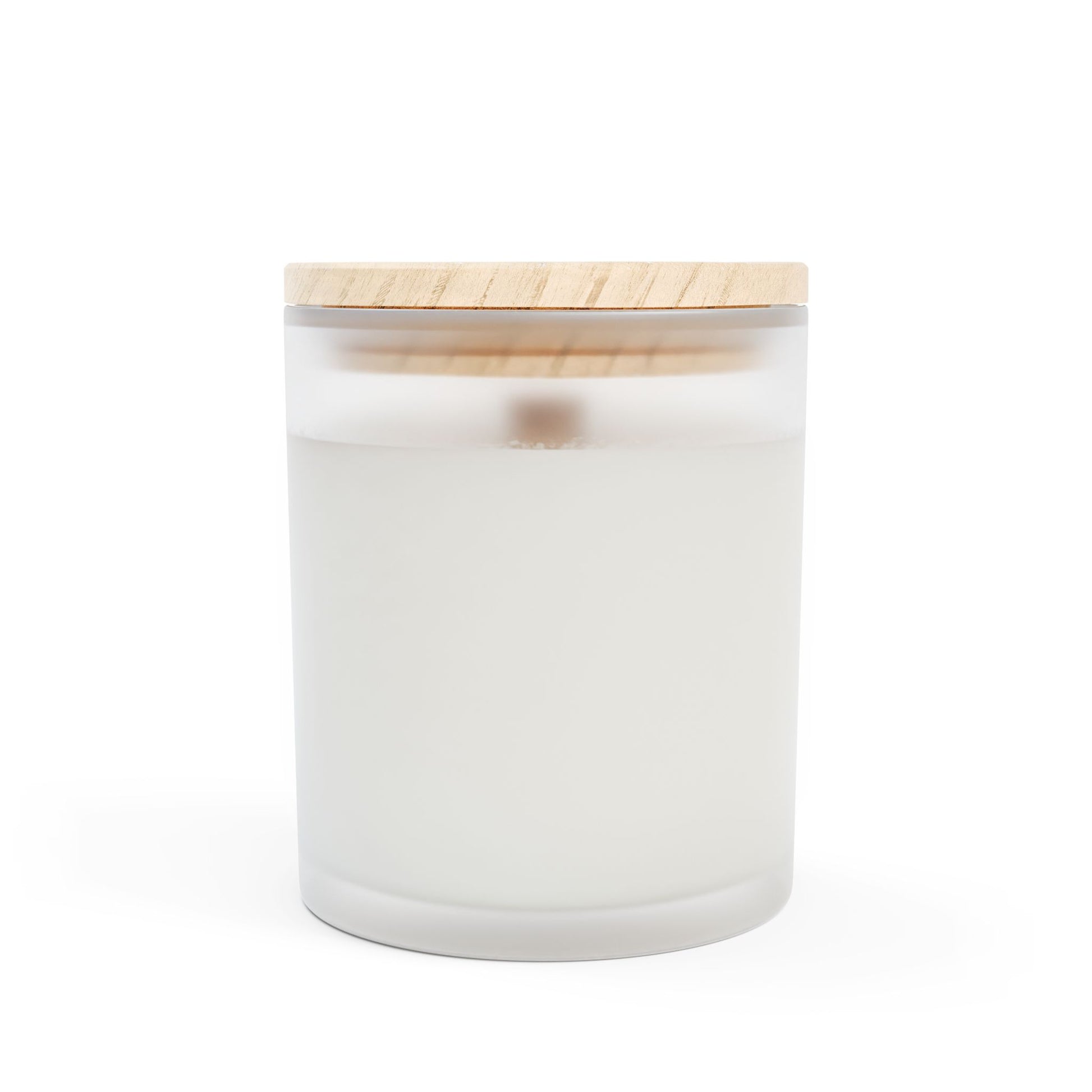 White candle in a glass jar with a wooden lid on a white background