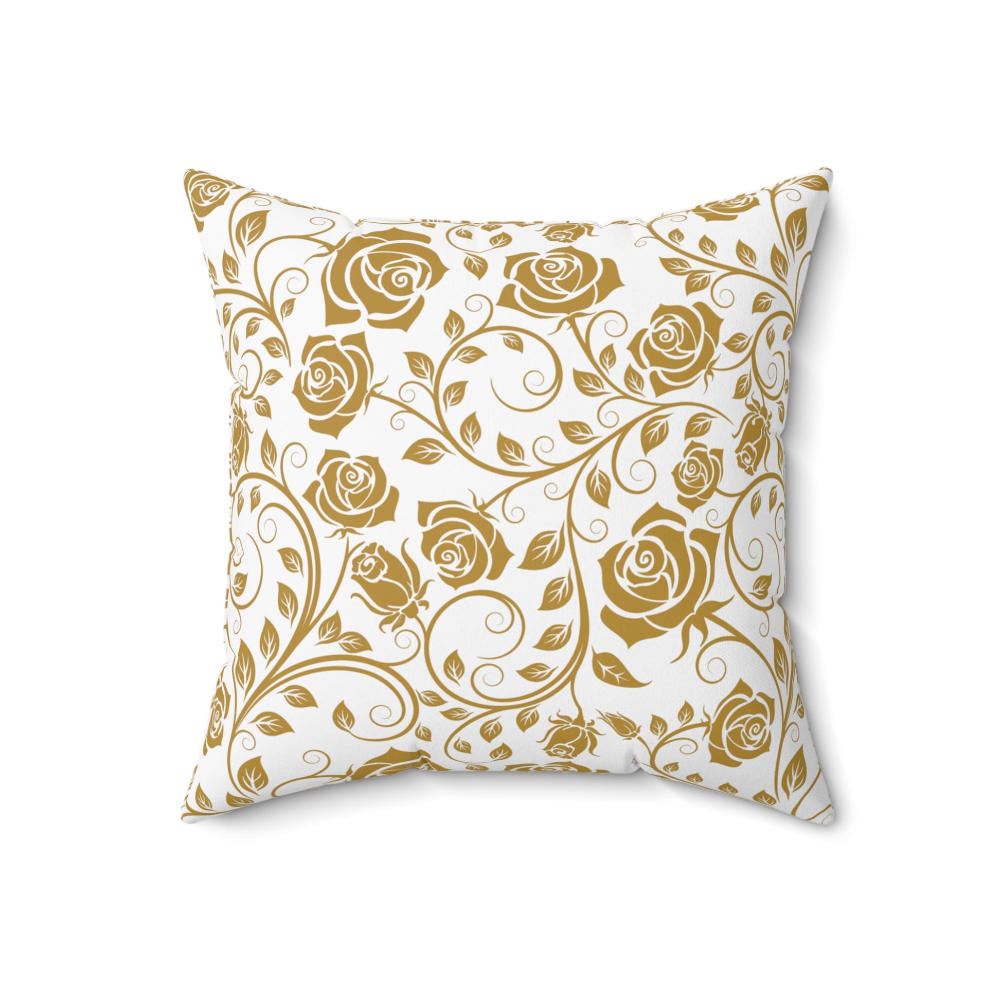 Decorative pillow with gold floral pattern on a white background