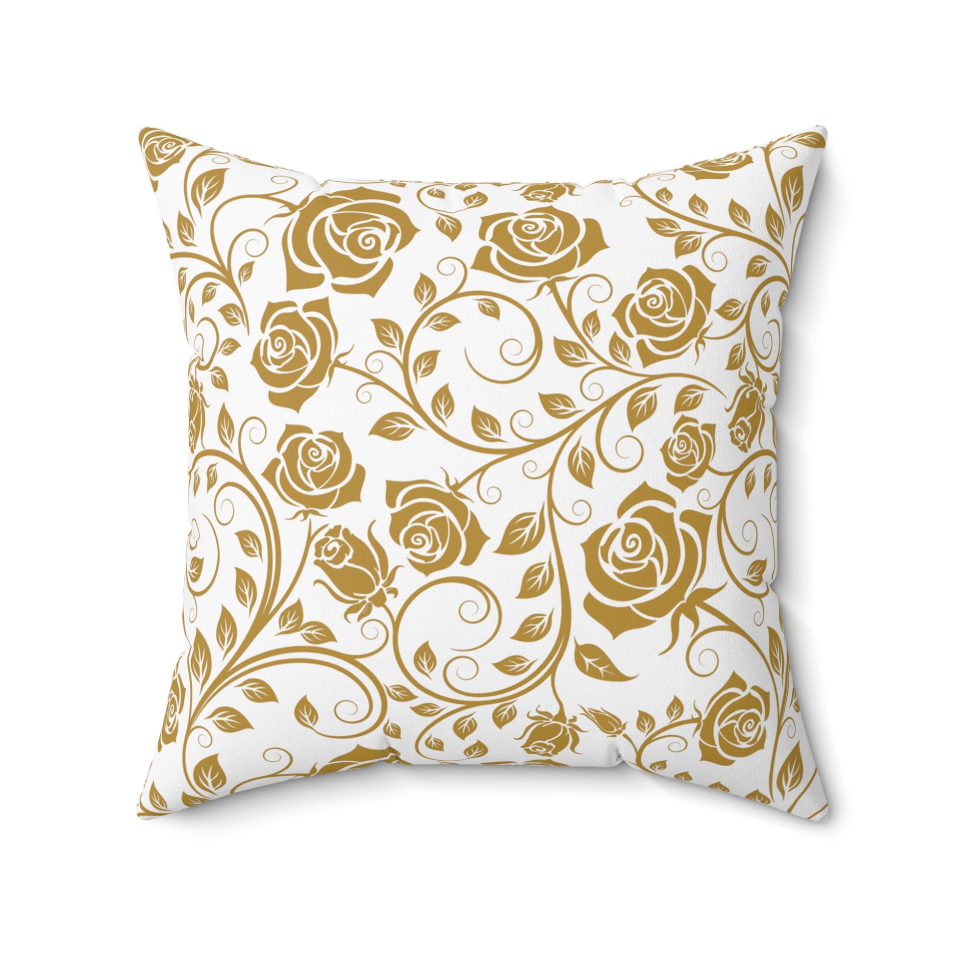 Decorative pillow with gold floral pattern on white background