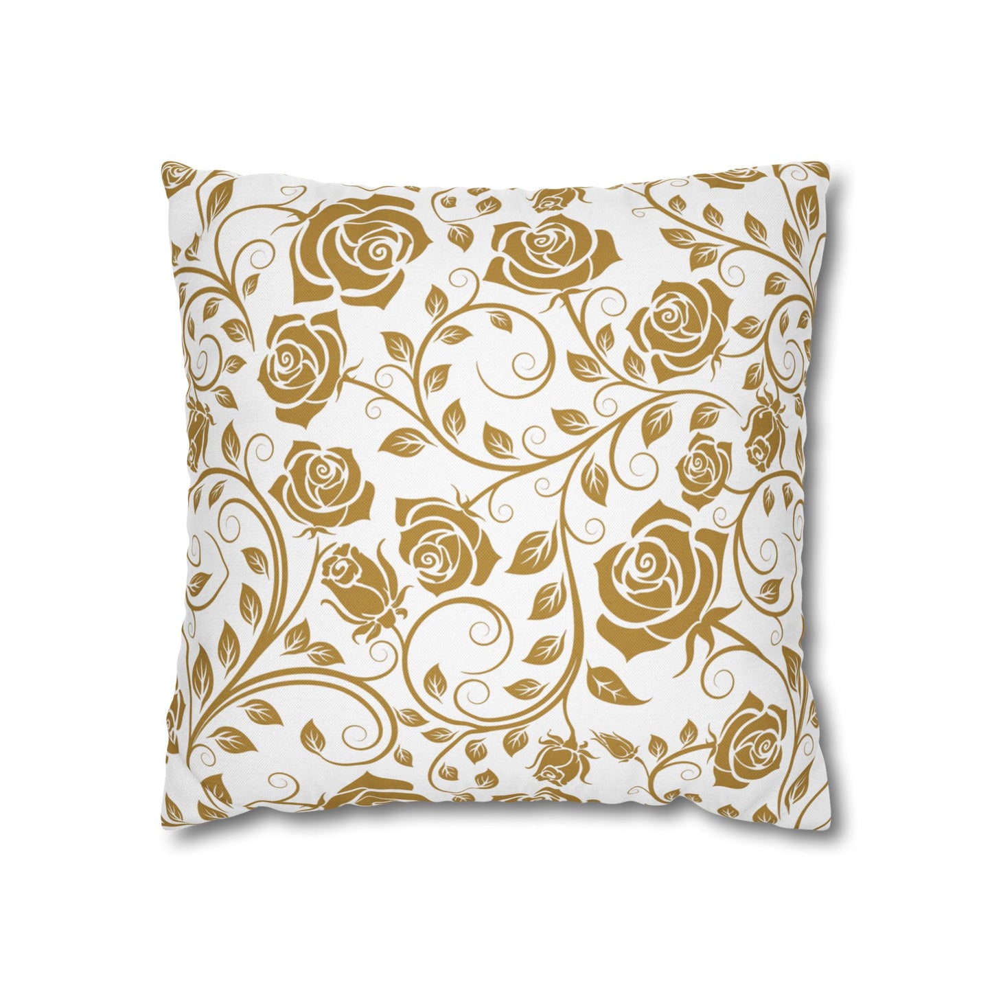 Decorative pillow with gold floral pattern on a white background