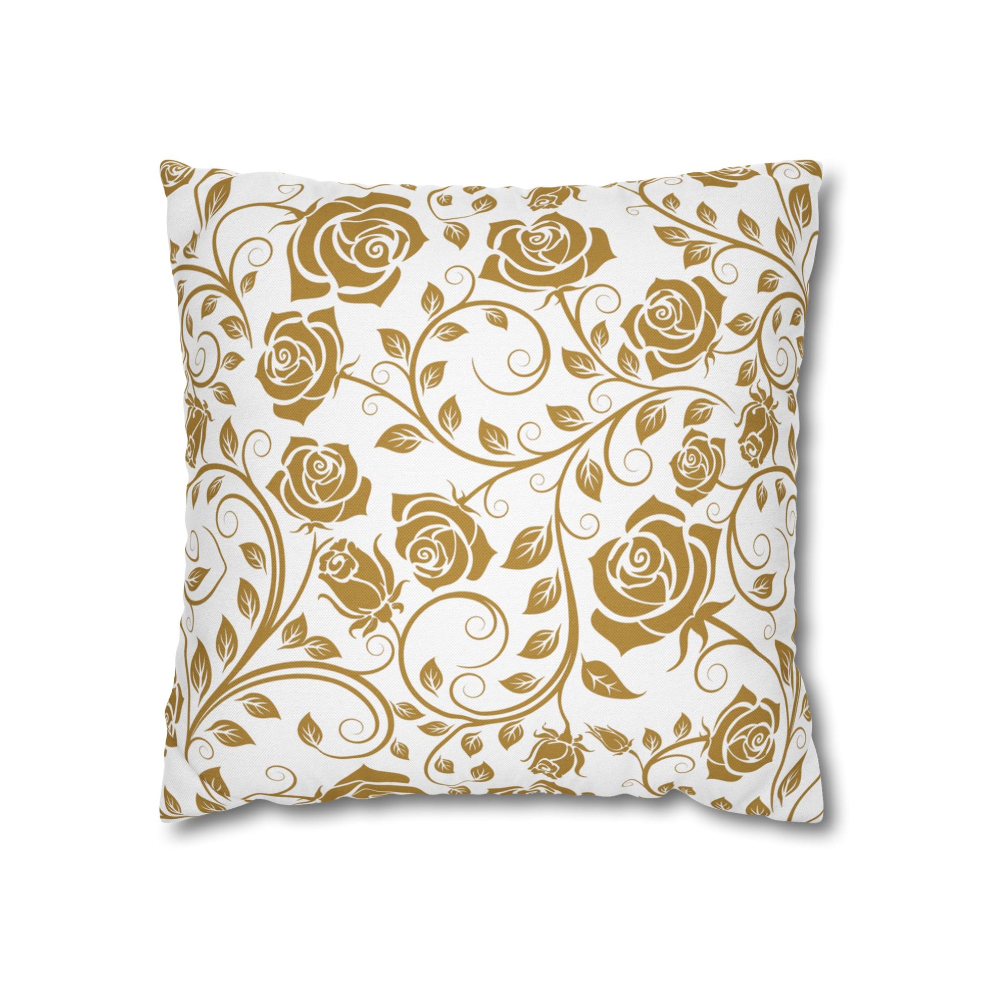 Decorative pillow with gold floral pattern on a white background