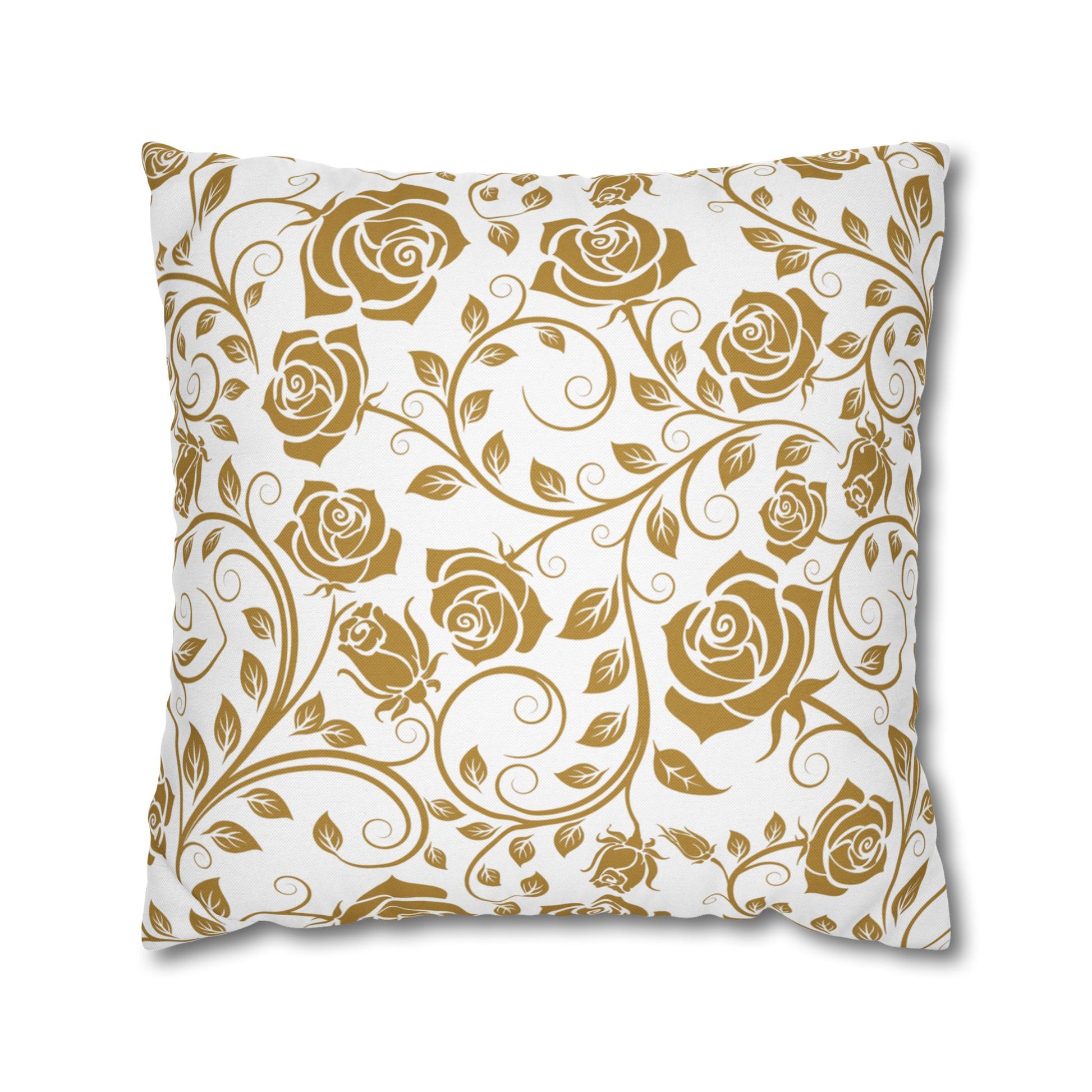 Decorative pillow with gold floral pattern on a white background