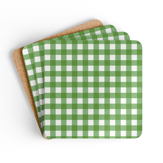 Set of green and white gingham checkered coasters with cork backing on a white background