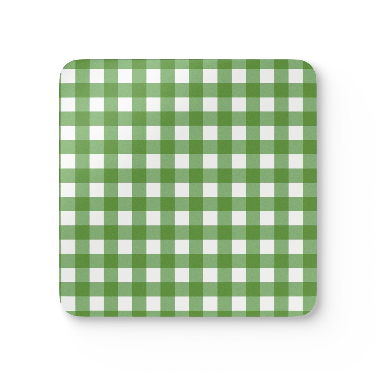 Green and white gingham checkered coaster with green and white pattern on front of coaster a white background.