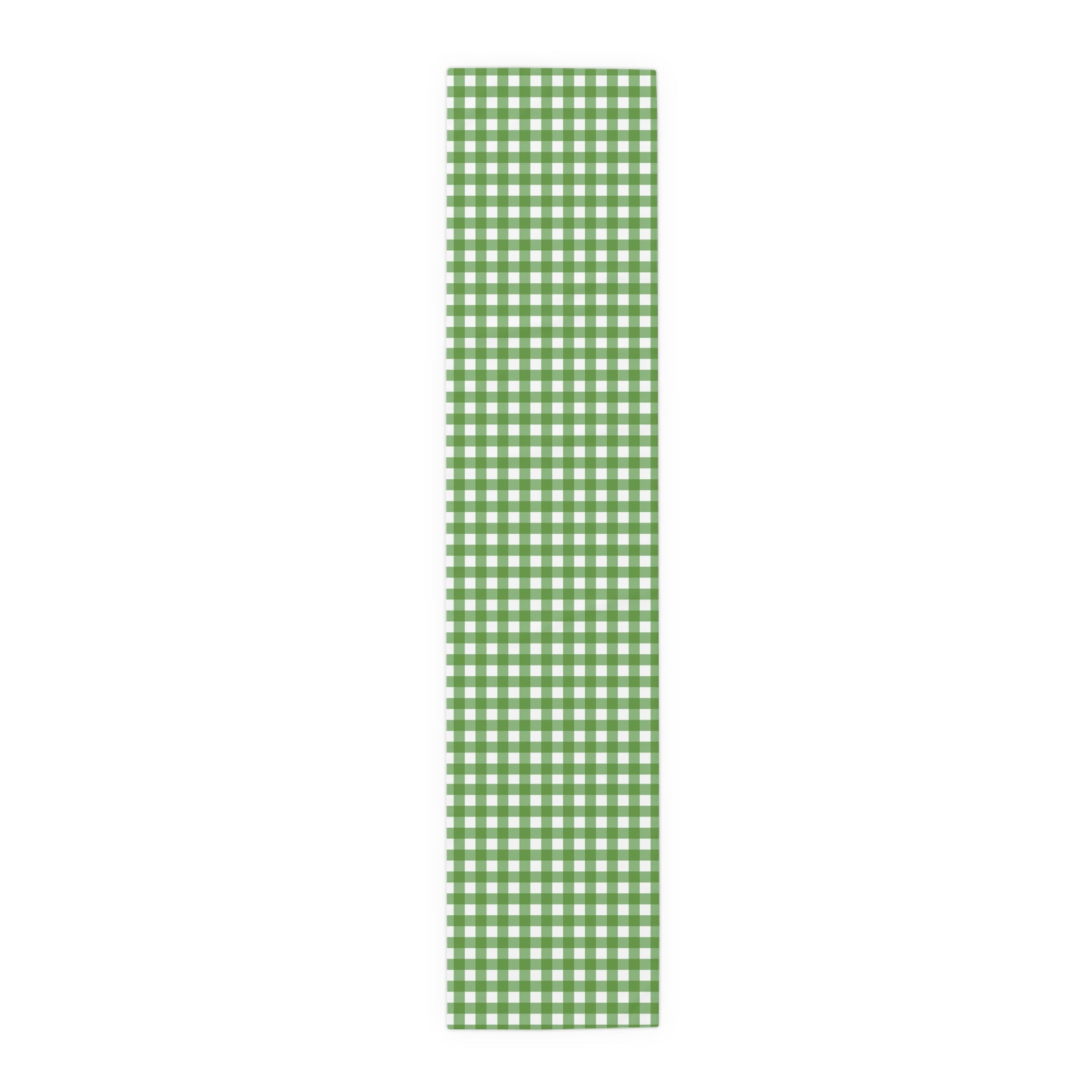 Green gingham checkered table runner with green and white gingham pattern printed on front of table runner, on a white background.