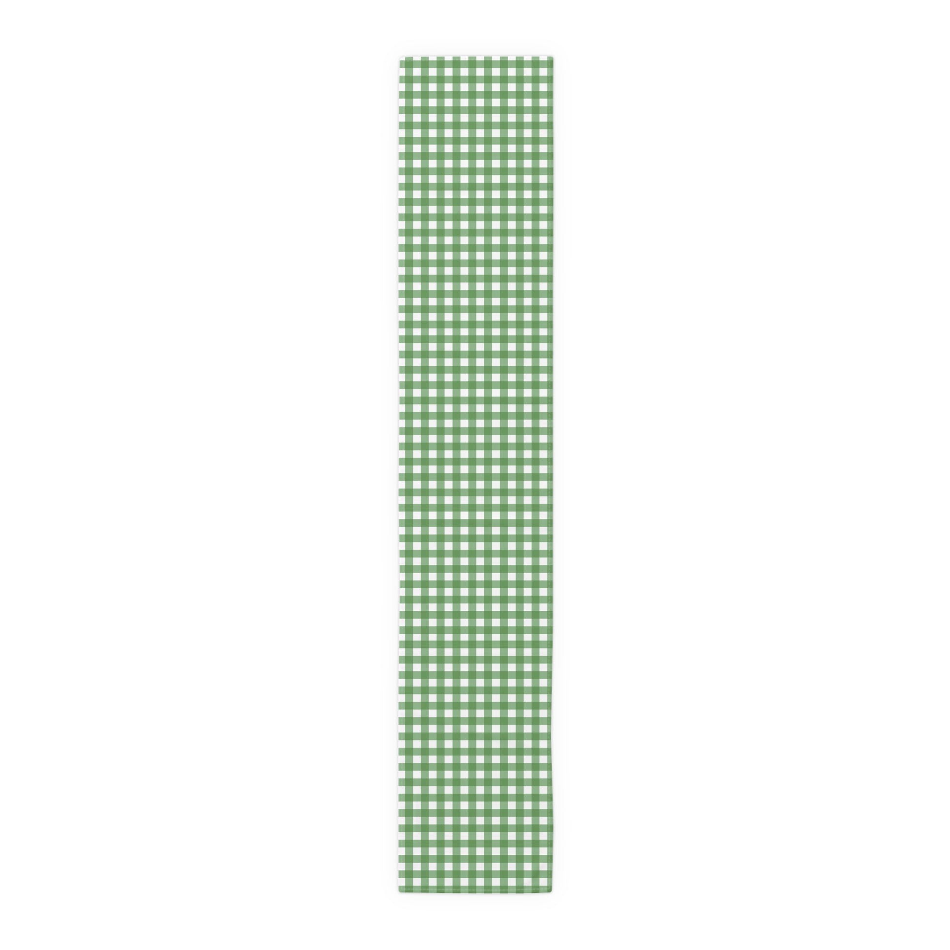 Green gingham checkered table runner with green and white gingham pattern printed on front of table runner, on a white background.