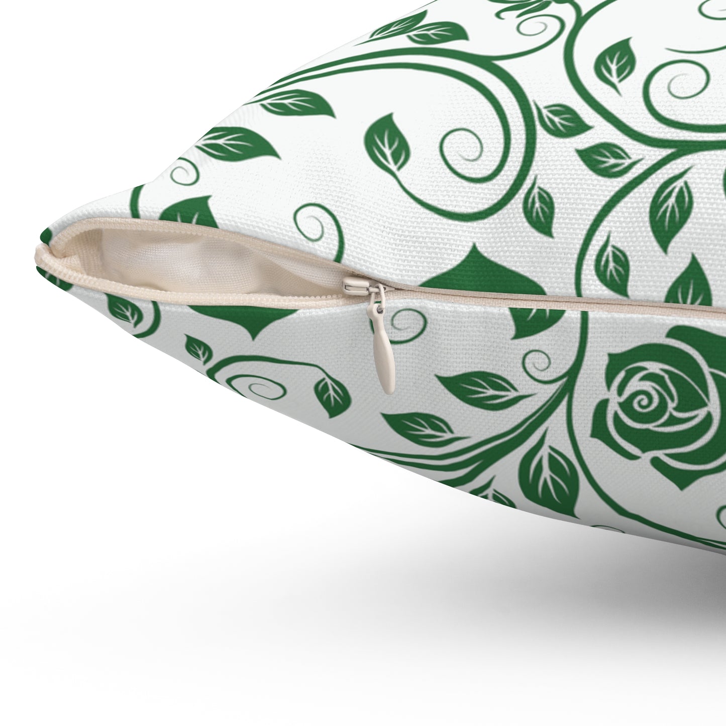 Pillow with green leaf pattern on a white background