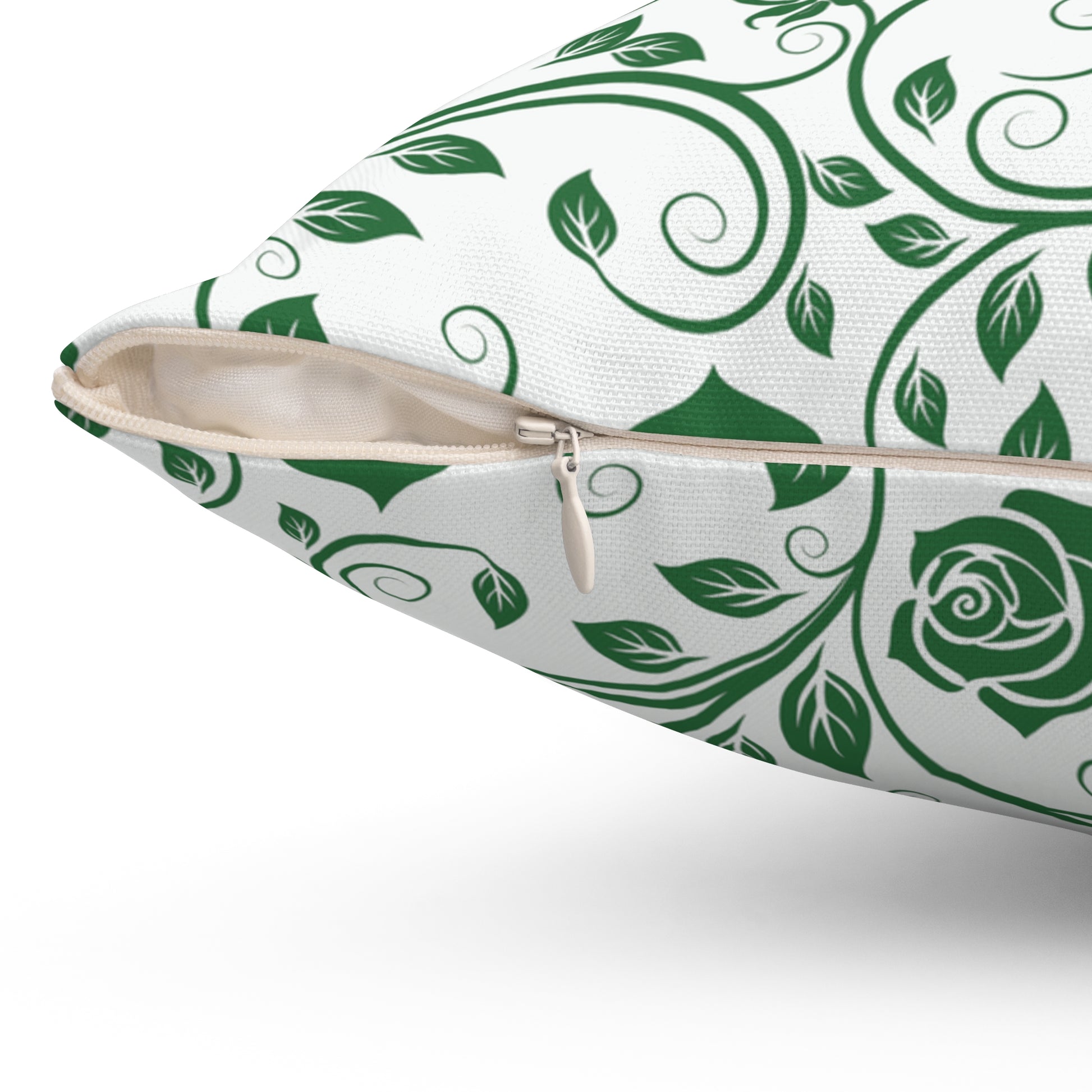 Pillow with green leaf pattern on a white background