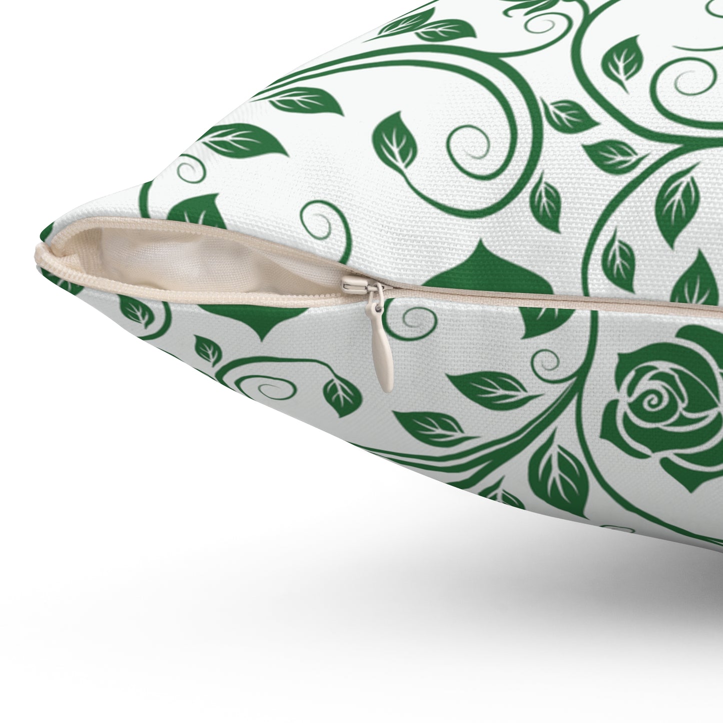 Pillow with green floral pattern with zipper closure on a white background