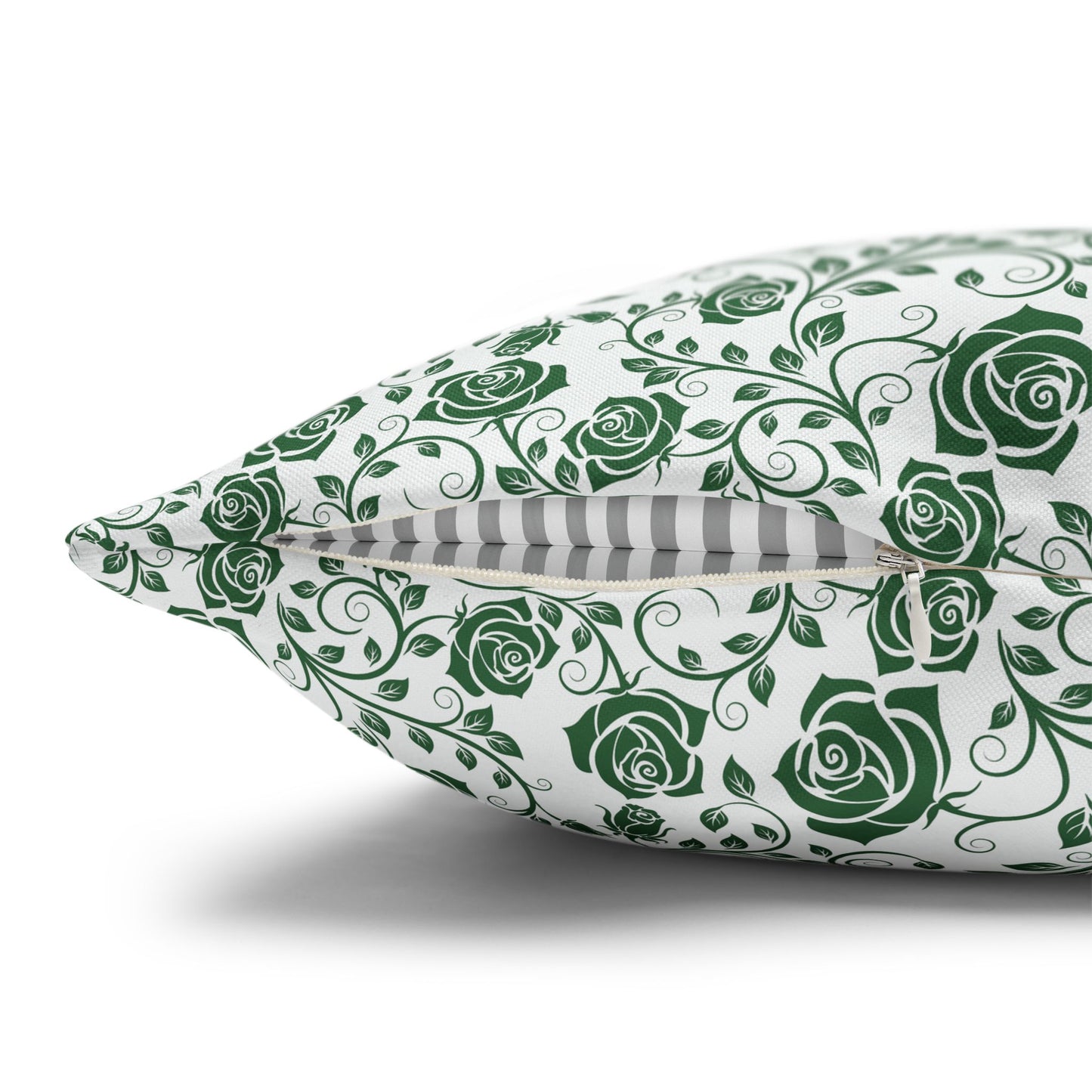 Decorative pillow with green floral pattern with zipper closure on a white background