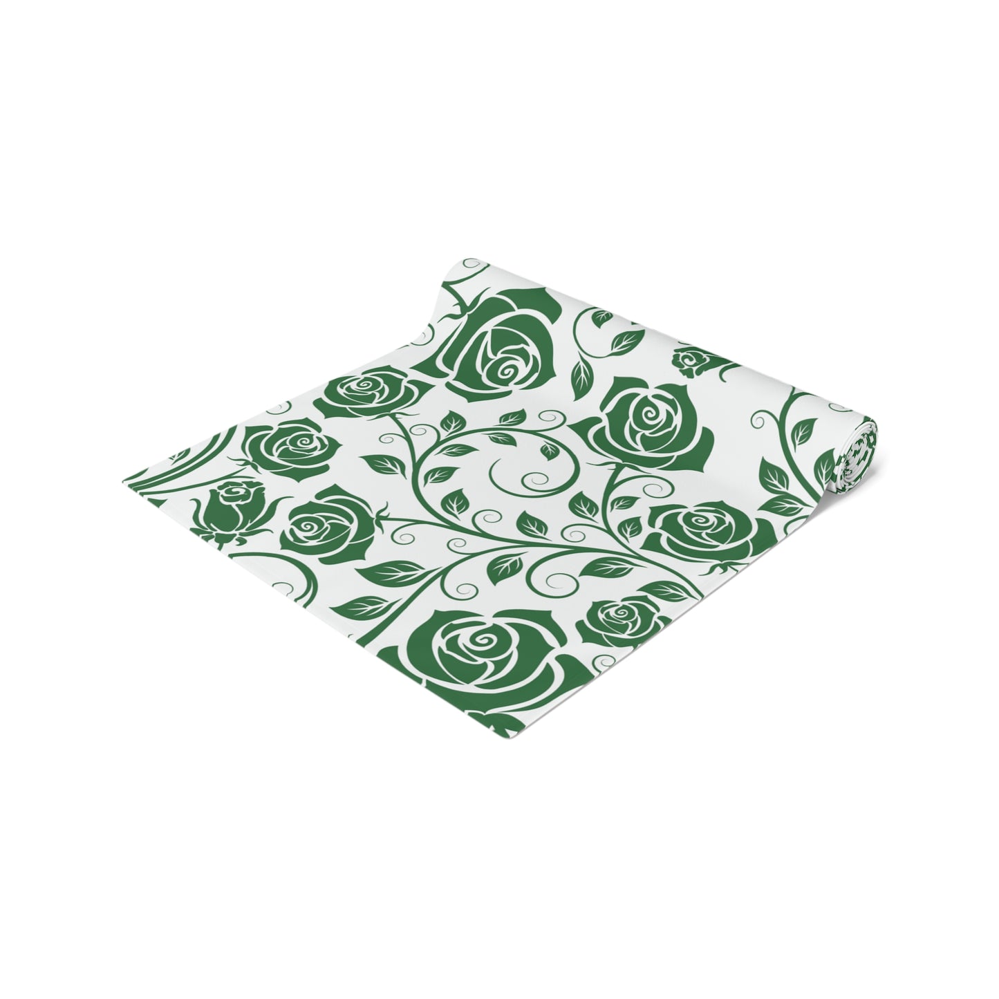 Table runner with green rose pattern rolled up on a white background